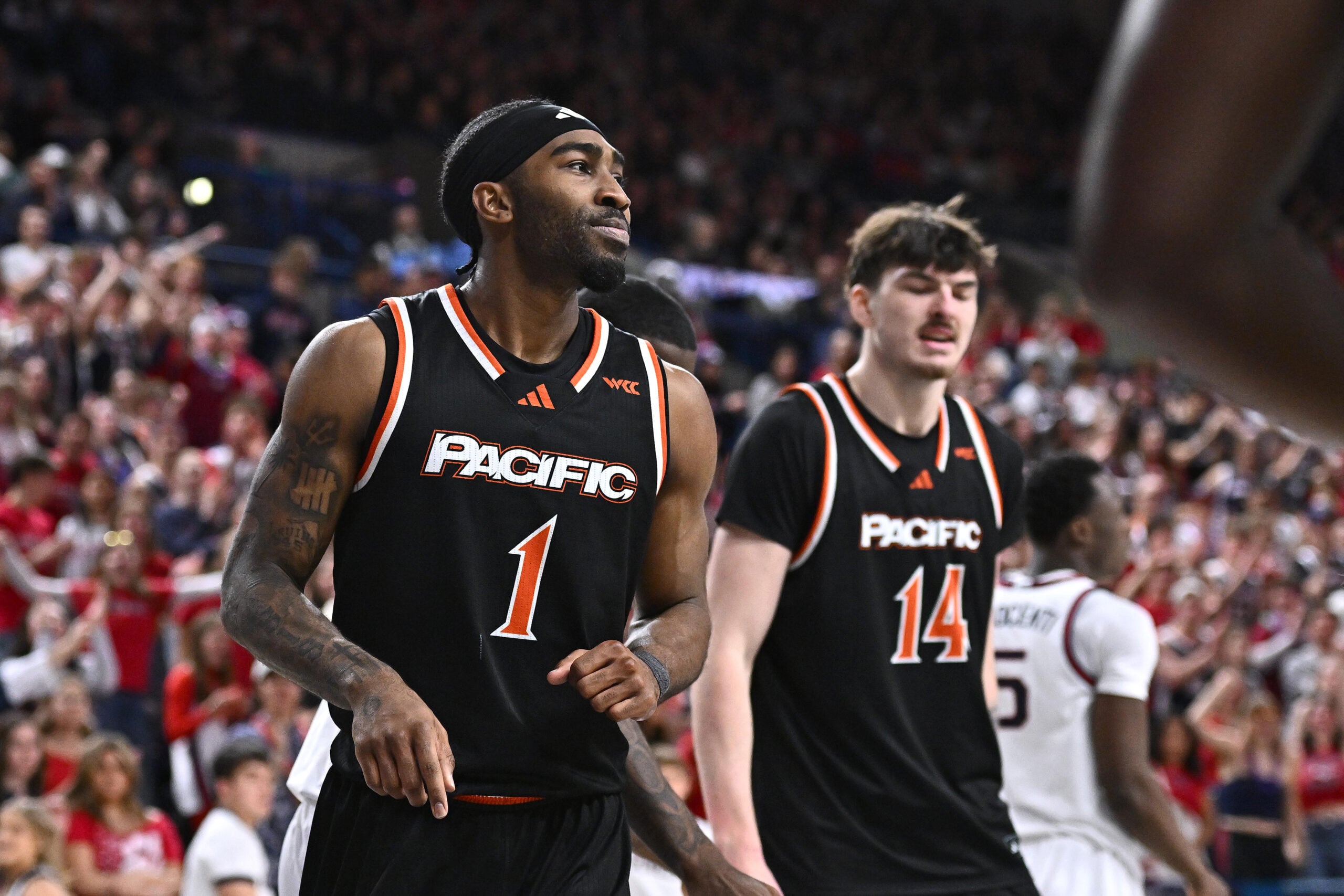 Feb 21, 2026; Spokane, Washington, USA; Pacific Tigers guard Justin Rochelin (1) reacts after a play against the Gonzaga Bulldogs in the second half at McCarthey Athletic Center. Gonzaga Bulldogs won 71-62. Mandatory Credit: James Snook-Imagn Images