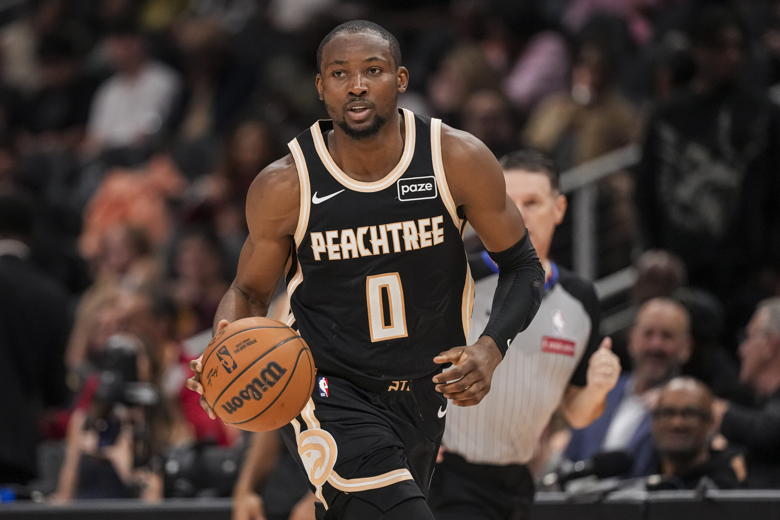 Feb 26, 2026; Atlanta, Georgia, USA; Atlanta Hawks forward Jonathan Kuminga (0) brings the ball up the court against the Washington Wizards during the second half at State Farm Arena. Mandatory Credit: Dale Zanine-Imagn Images