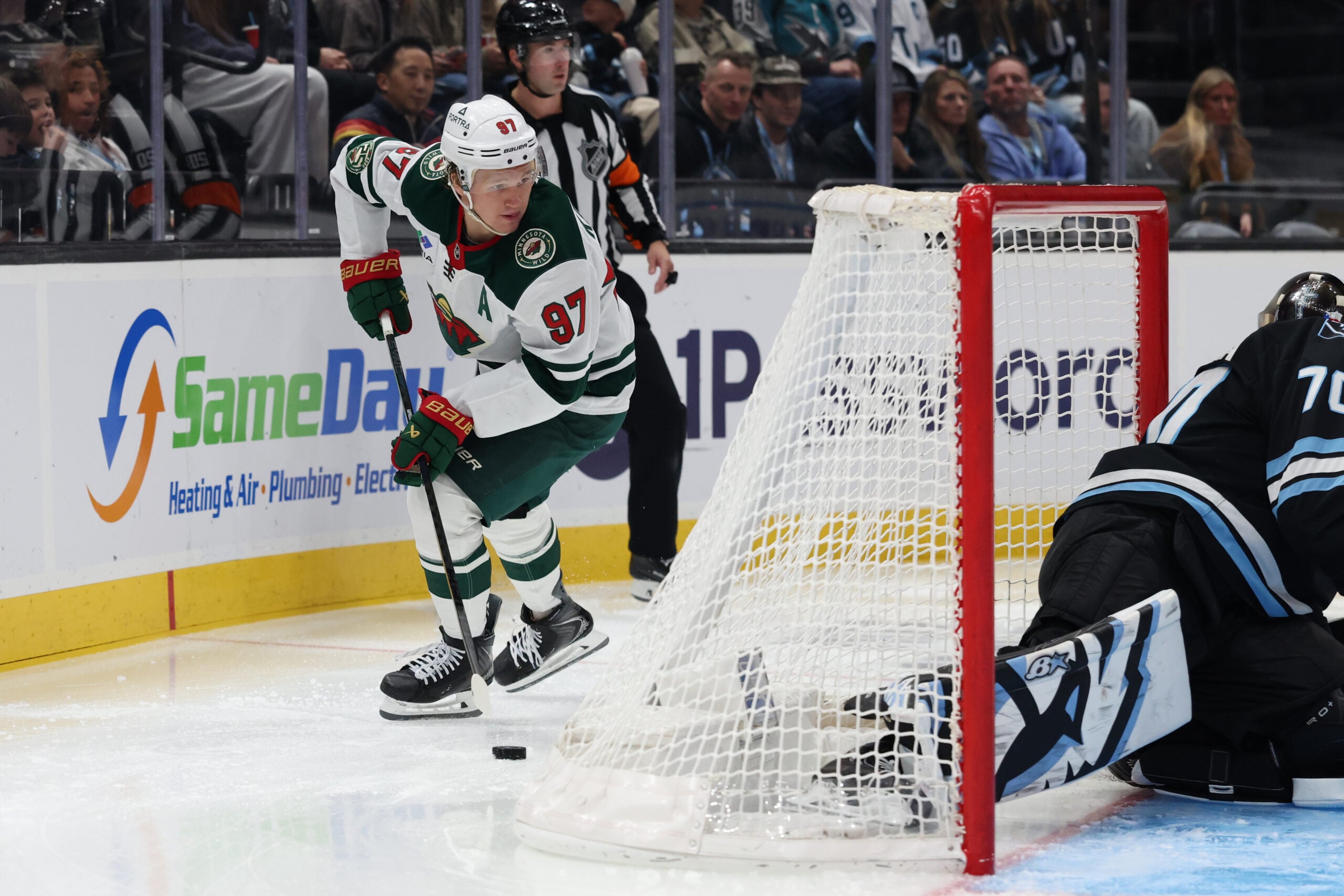 Feb 27, 2026; Salt Lake City, Utah, USA; Minnesota Wild left wing Kirill Kaprizov (97) looks for a play against the Utah Mammoth during the third period at Delta Center. Mandatory Credit: Rob Gray-Imagn Images