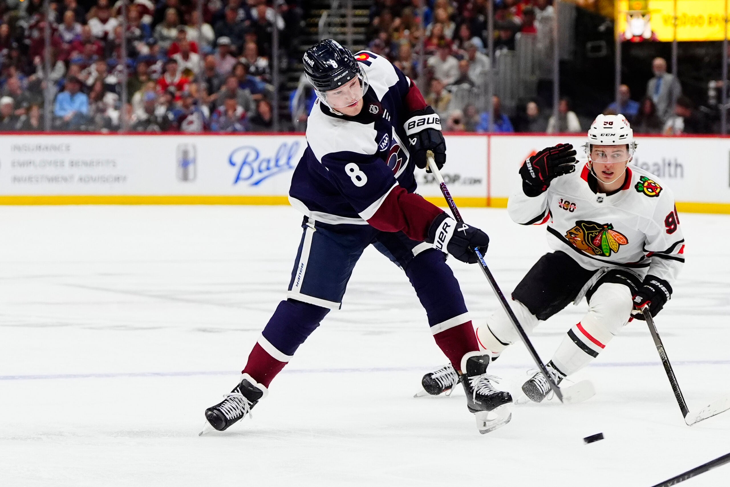 Feb 28, 2026; Denver, Colorado, USA; Colorado Avalanche defenseman Cale Makar (8) shoots the puck in the second period against the Chicago Blackhawks at Ball Arena. Mandatory Credit: Ron Chenoy-Imagn Images