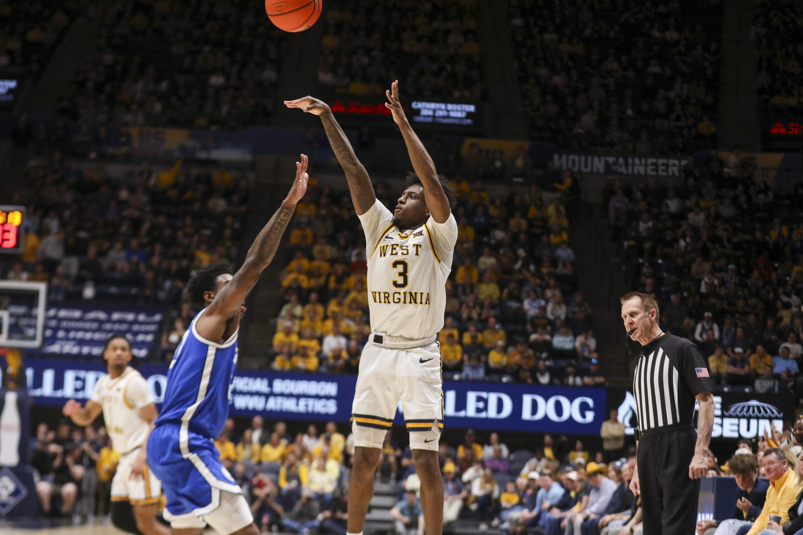 Feb 28, 2026; Morgantown, West Virginia, USA; West Virginia Mountaineers guard Honor Huff (3) shoots during the second half against the BYU Cougars at Hope Coliseum. Mandatory Credit: Ben Queen-Imagn Images
