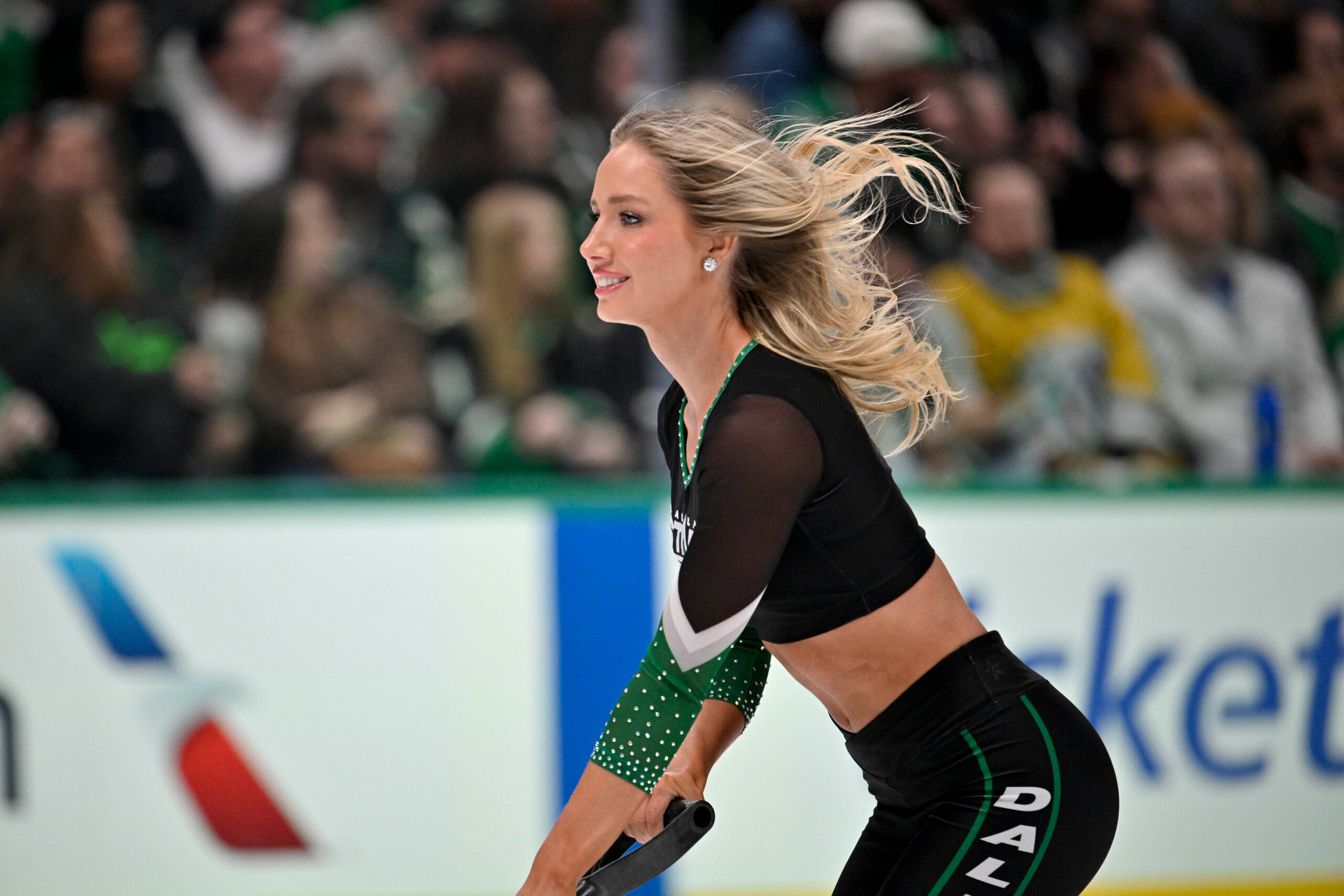 Feb 28, 2026; Dallas, Texas, USA; The Dallas Stars ice girls clear the ice during the third period against the Nashville Predators at the American Airlines Center. Mandatory Credit: Jerome Miron-Imagn Images