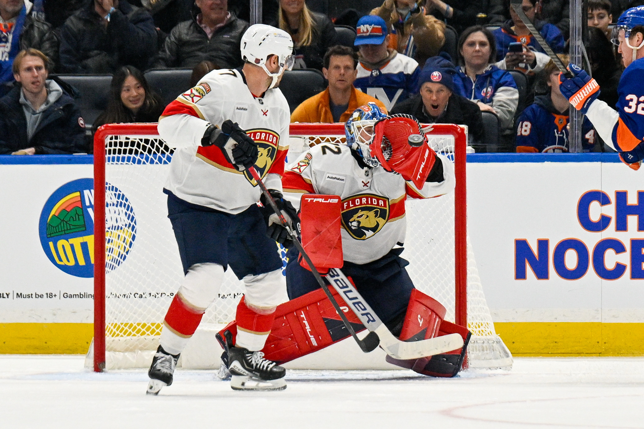 Mar 1, 2026; Elmont, New York, USA; Florida Panthers goaltender Sergei Bobrovsky (72) makes a glove save against the New York Islanders during the third period at UBS Arena. Mandatory Credit: Dennis Schneidler-Imagn Images