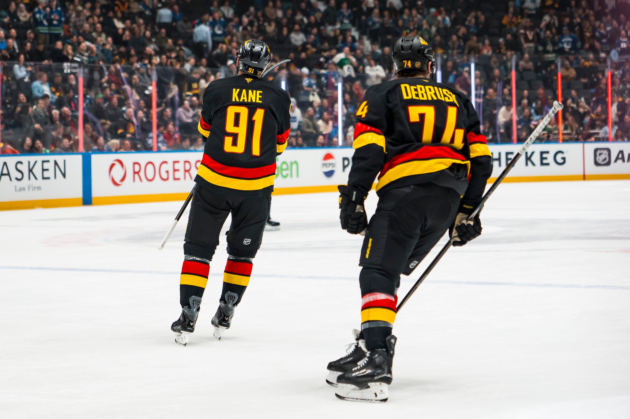 Mar 2, 2026; Vancouver, British Columbia, CAN; Vancouver Canucks forward Jake DeBrusk (74) and forward Evander Kane (91) celebrate Kane’s goal against the Dallas Stars in the first period at Rogers Arena. Mandatory Credit: Bob Frid-Imagn Images