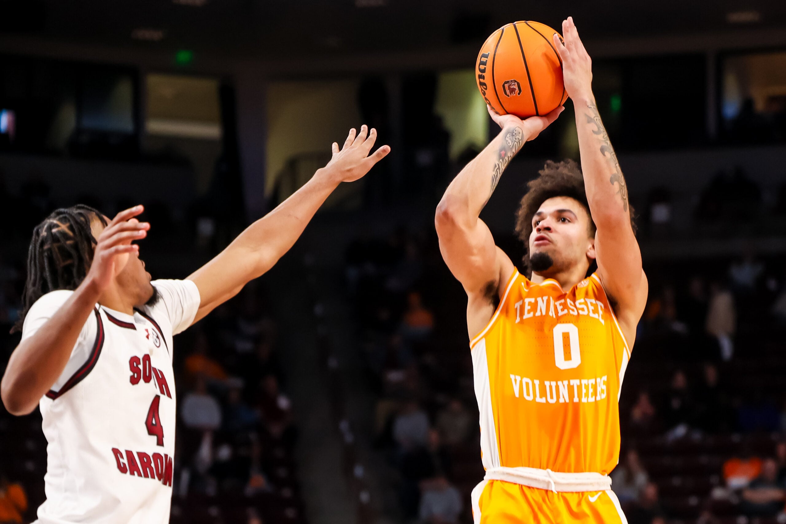 Mar 3, 2026; Columbia, South Carolina, USA; Tennessee Volunteers guard Ja'kobi Gillespie (0) shoots over South Carolina Gamecocks guard Kobe Knox (4) in the second half at Colonial Life Arena. Mandatory Credit: Jeff Blake-Imagn Images