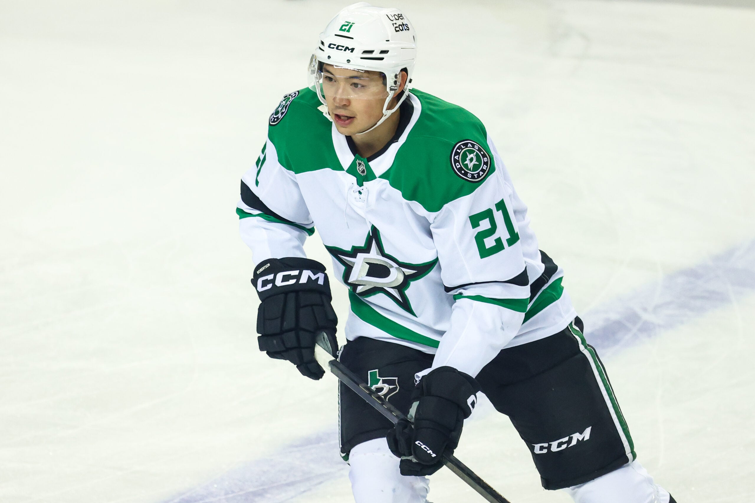 Mar 3, 2026; Calgary, Alberta, CAN; Dallas Stars left wing Jason Robertson (21) skates during the warmup period against the Calgary Flames at Scotiabank Saddledome. Mandatory Credit: Sergei Belski-Imagn Images