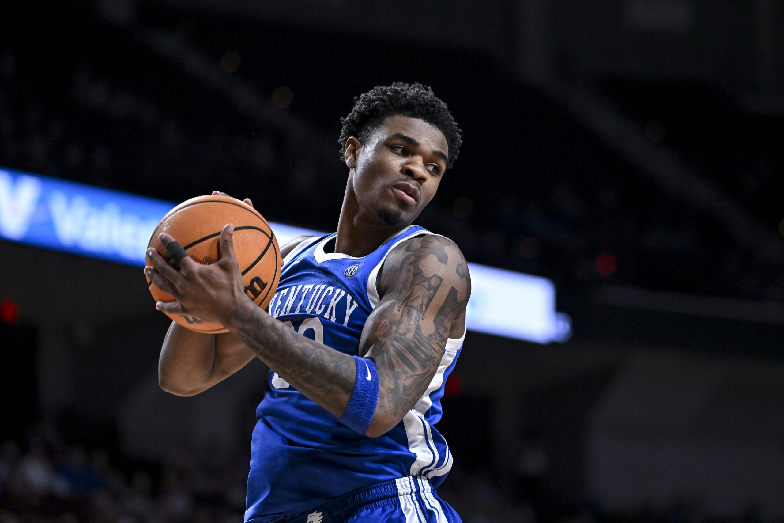 Mar 3, 2026; College Station, Texas, USA; Kentucky Wildcats guard Otega Oweh (00) secures a rebound during the second half against the Texas A&M Aggies at Reed Arena. Mandatory Credit: Maria Lysaker-Imagn Images