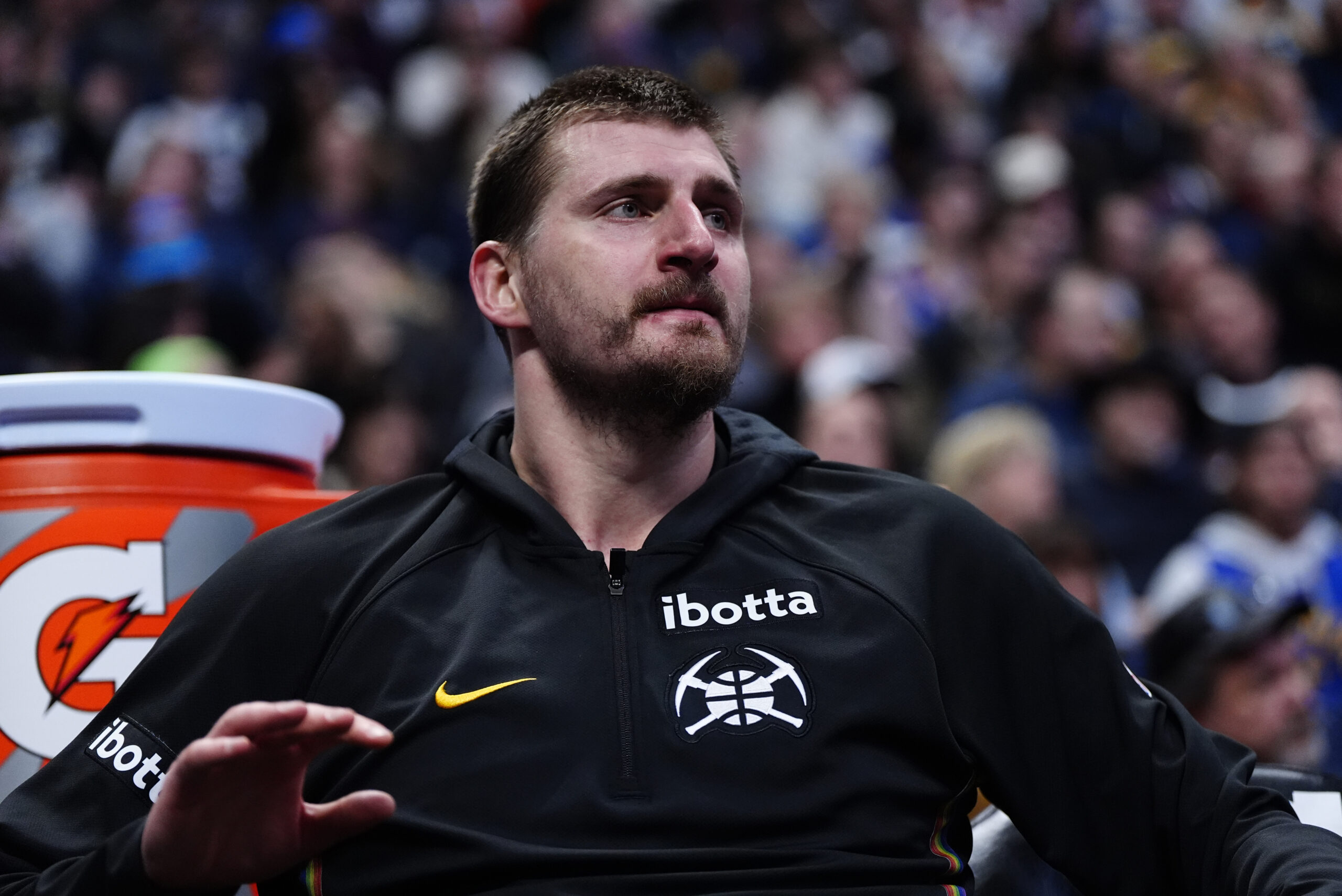 Mar 6, 2026; Denver, Colorado, USA; Denver Nuggets center Nikola Jokic (15) on the bench in the fourth quarter against the New York Knicks at Ball Arena. Mandatory Credit: Ron Chenoy-Imagn Images