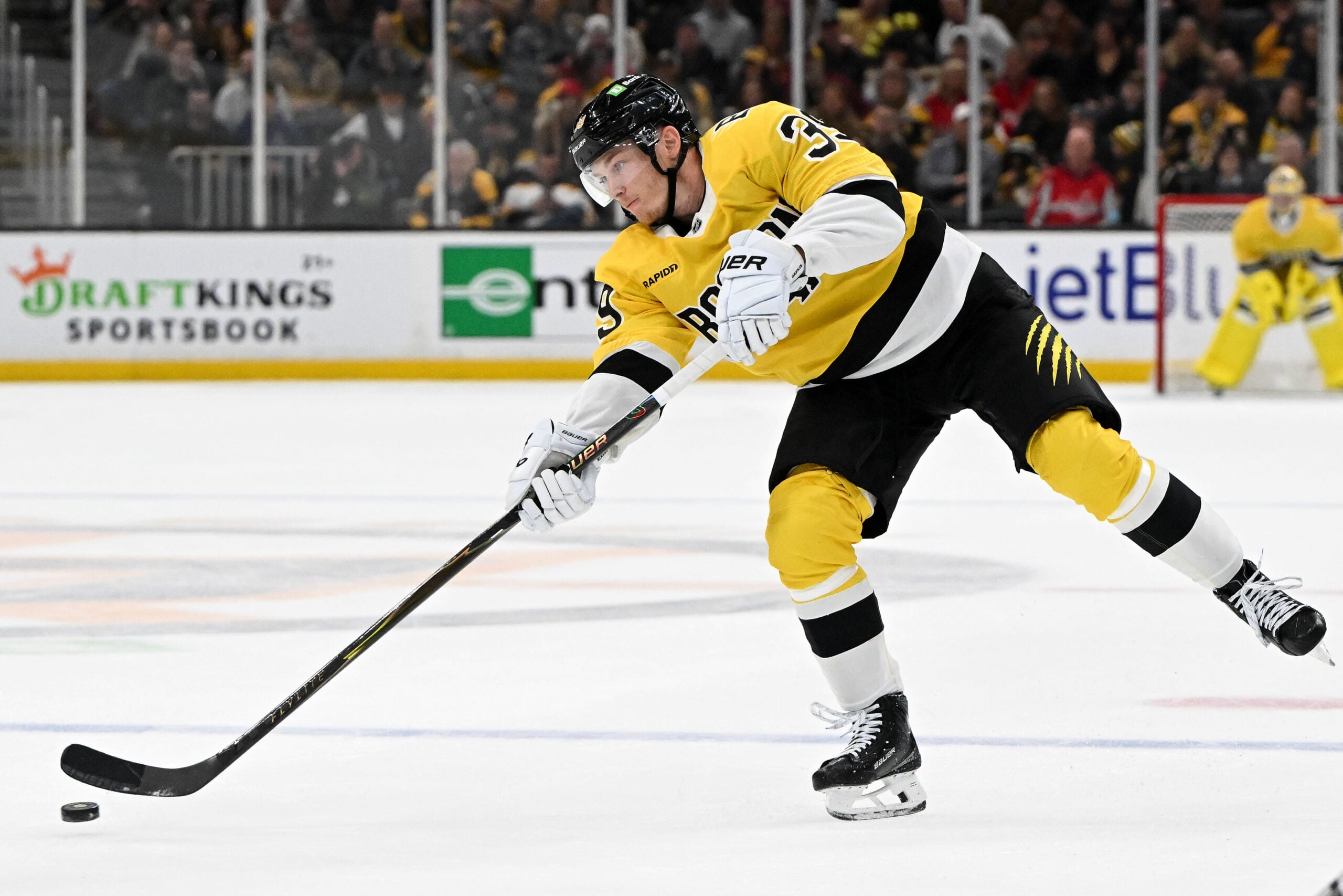 Mar 7, 2026; Boston, Massachusetts, USA; Boston Bruins center Morgan Geekie (39) takes a shot against the Washington Capitals during the third period at the TD Garden. Mandatory Credit: Brian Fluharty-Imagn Images