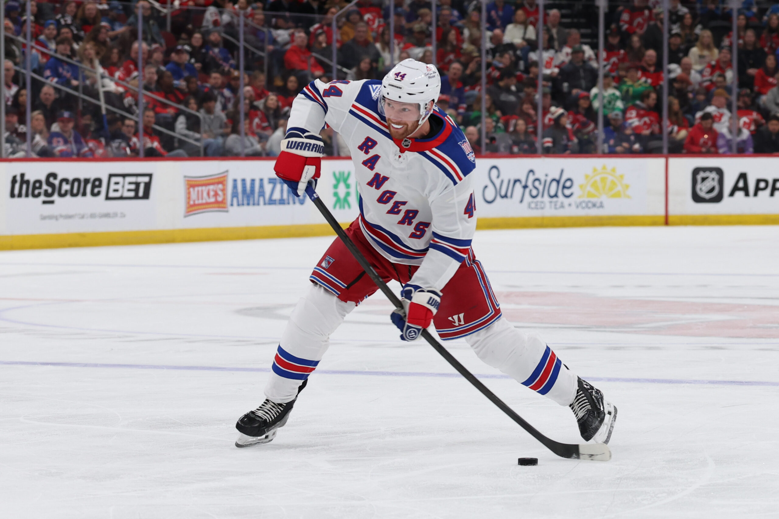 Mar 7, 2026; Newark, New Jersey, USA; New York Rangers defenseman Vladislav Gavrikov (44) takes a shot for a goal against the New Jersey Devils during the first period at Prudential Center. Mandatory Credit: Thomas Salus-Imagn Images