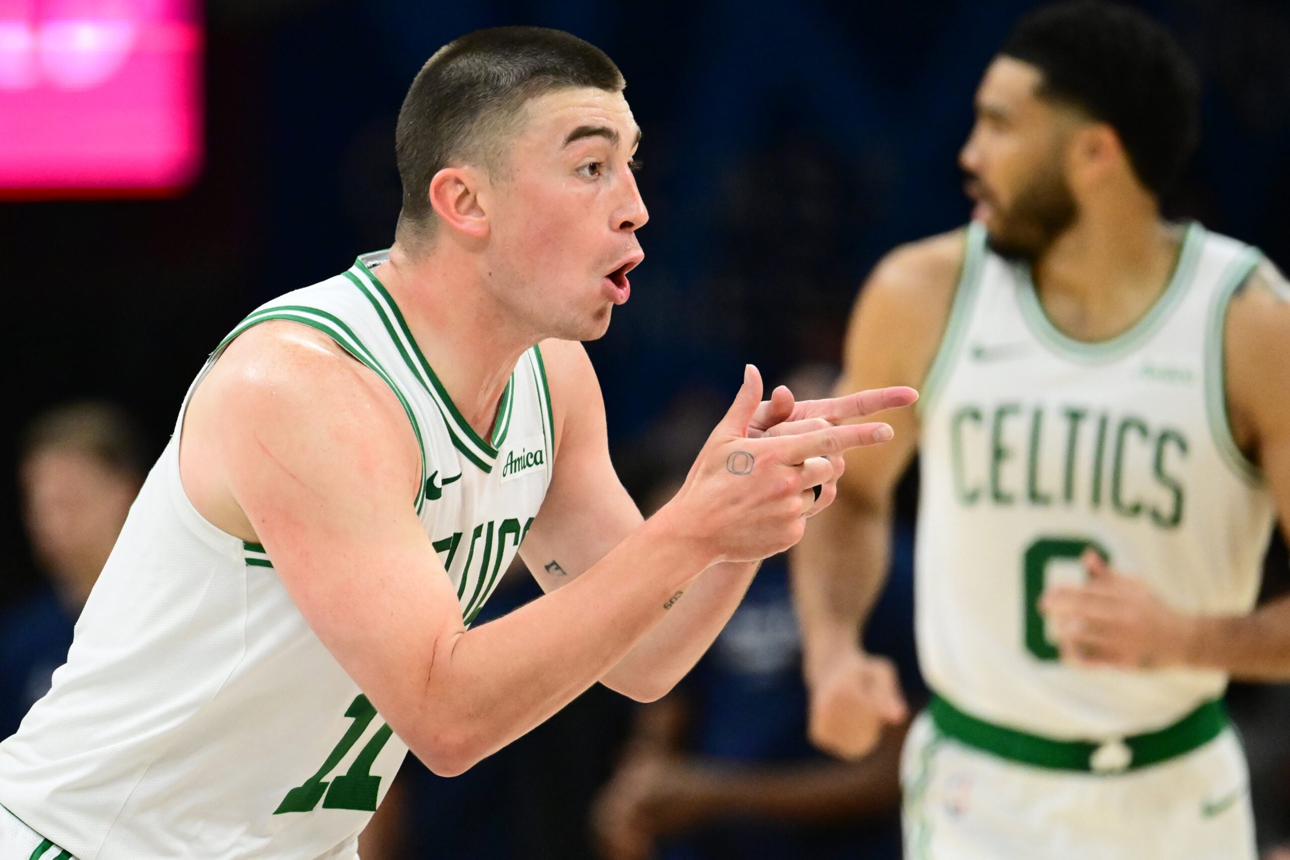 Mar 8, 2026; Cleveland, Ohio, USA; Boston Celtics guard Payton Pritchard (11) celebrates after hitting a three point basket against the Cleveland Cavaliers during the second half at Rocket Arena. Mandatory Credit: Ken Blaze-Imagn Images