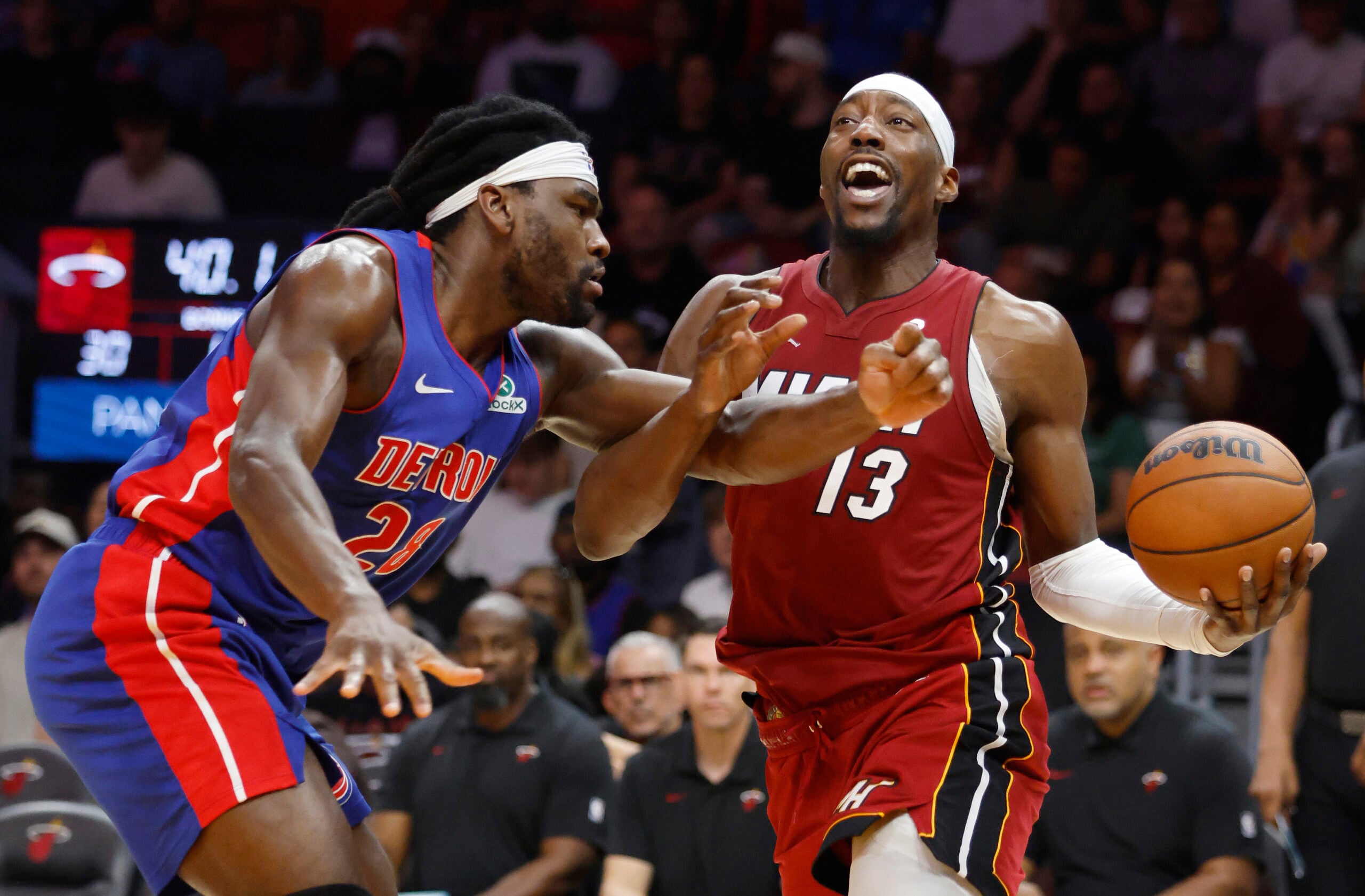 Mar 8, 2026; Miami, Florida, USA;  Detroit Pistons forward Isaiah Stewart (28) fouls Miami Heat center Bam Adebayo (13) during the first half at Kaseya Center. Mandatory Credit: Rhona Wise-Imagn Images
