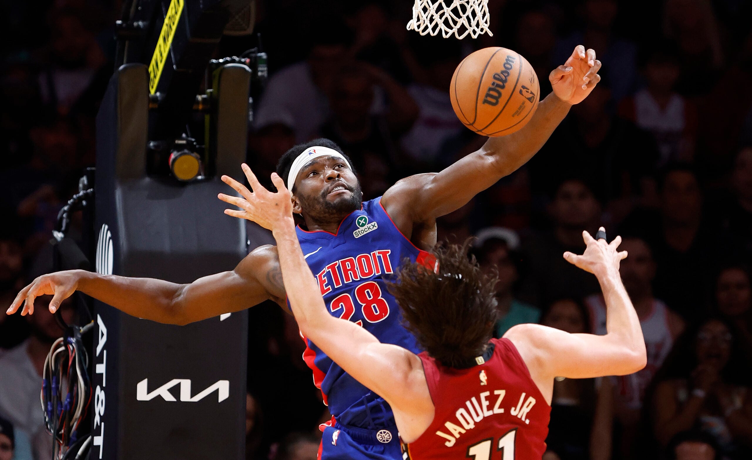 Mar 8, 2026; Miami, Florida, USA;  Detroit Pistons forward Isaiah Stewart (28) blocks a shot by Miami Heat forward Jaime Jaquez Jr. (11) during the second half at Kaseya Center. Mandatory Credit: Rhona Wise-Imagn Images
