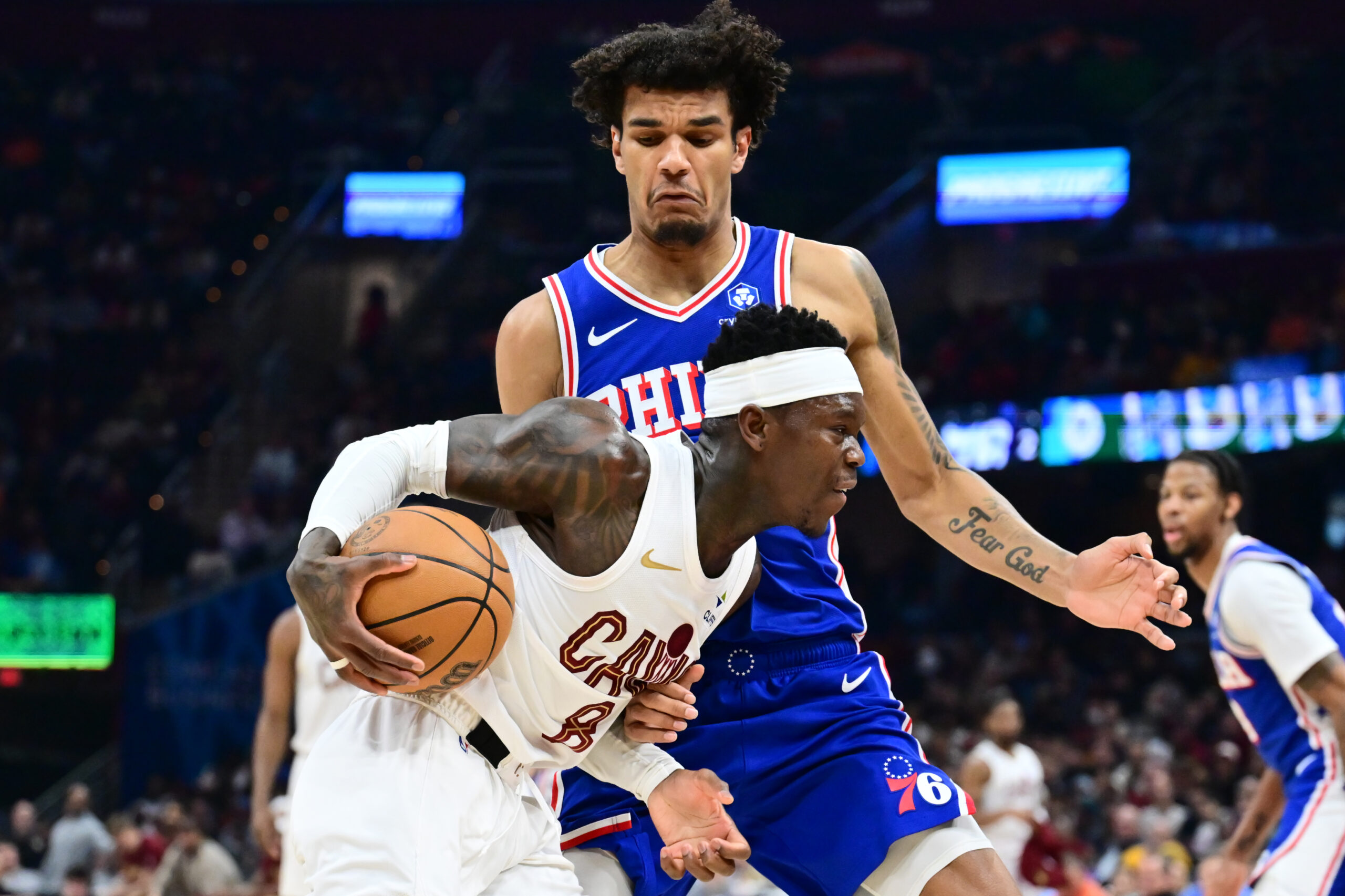 Mar 9, 2026; Cleveland, Ohio, USA; Cleveland Cavaliers guard Dennis Schroder (8) drives to the basket against Philadelphia 76ers forward Dominick Barlow (25) during the second half at Rocket Arena. Mandatory Credit: Ken Blaze-Imagn Images