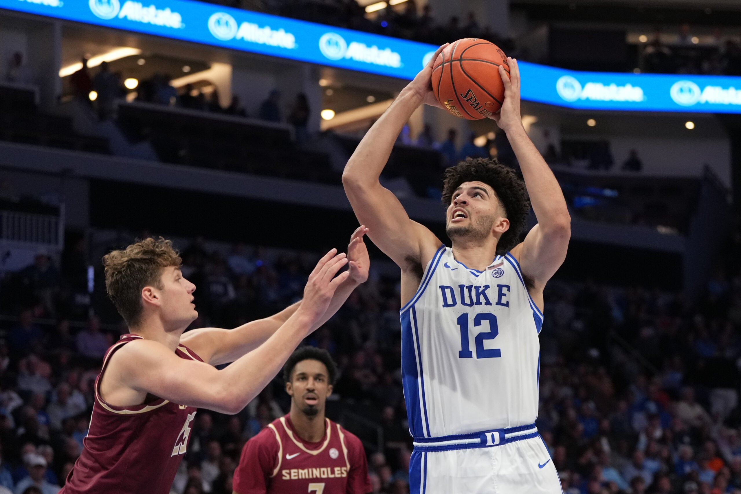 Mar 12, 2026; Charlotte, NC, USA; Duke Blue Devils forward Cameron Boozer (12) shoots as Florida State Seminoles forward Alex Steen (25) defends in the second half at Spectrum Center. Mandatory Credit: Bob Donnan-Imagn Images
