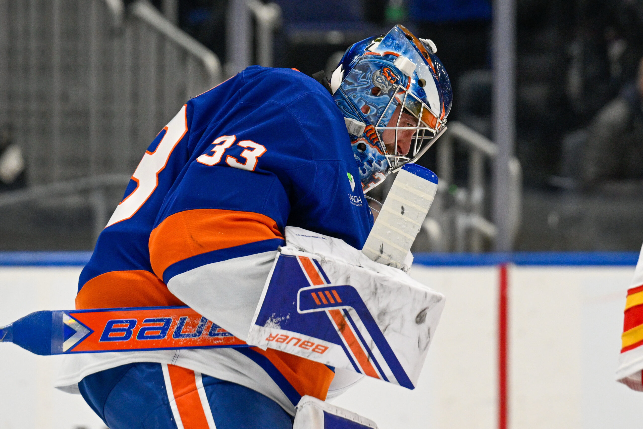 Mar 14, 2026; Elmont, New York, USA;  New York Islanders goaltender David Rittich (33) celebrates the 3-2 victory over the Calgary Flames after the game at UBS Arena. Mandatory Credit: Dennis Schneidler-Imagn Images