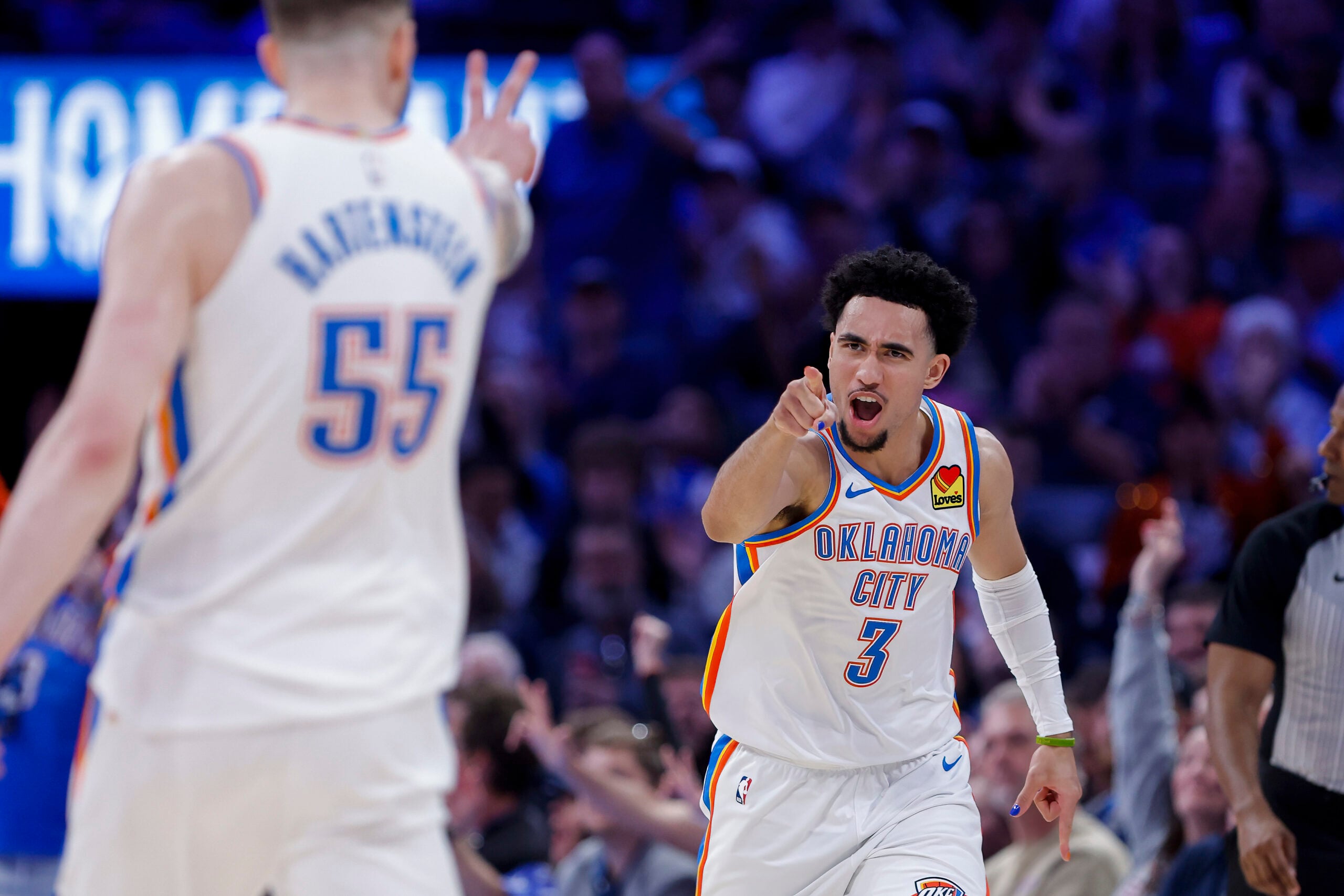 Mar 15, 2026; Oklahoma City, Oklahoma, USA; Oklahoma City Thunder guard Jared McCain (3) gestures towards teammate, center/forward Isaiah Hartenstein (55) after scoring against the Minnesota Timberwolves during the second half at Paycom Center. Mandatory Credit: Alonzo Adams-Imagn Images