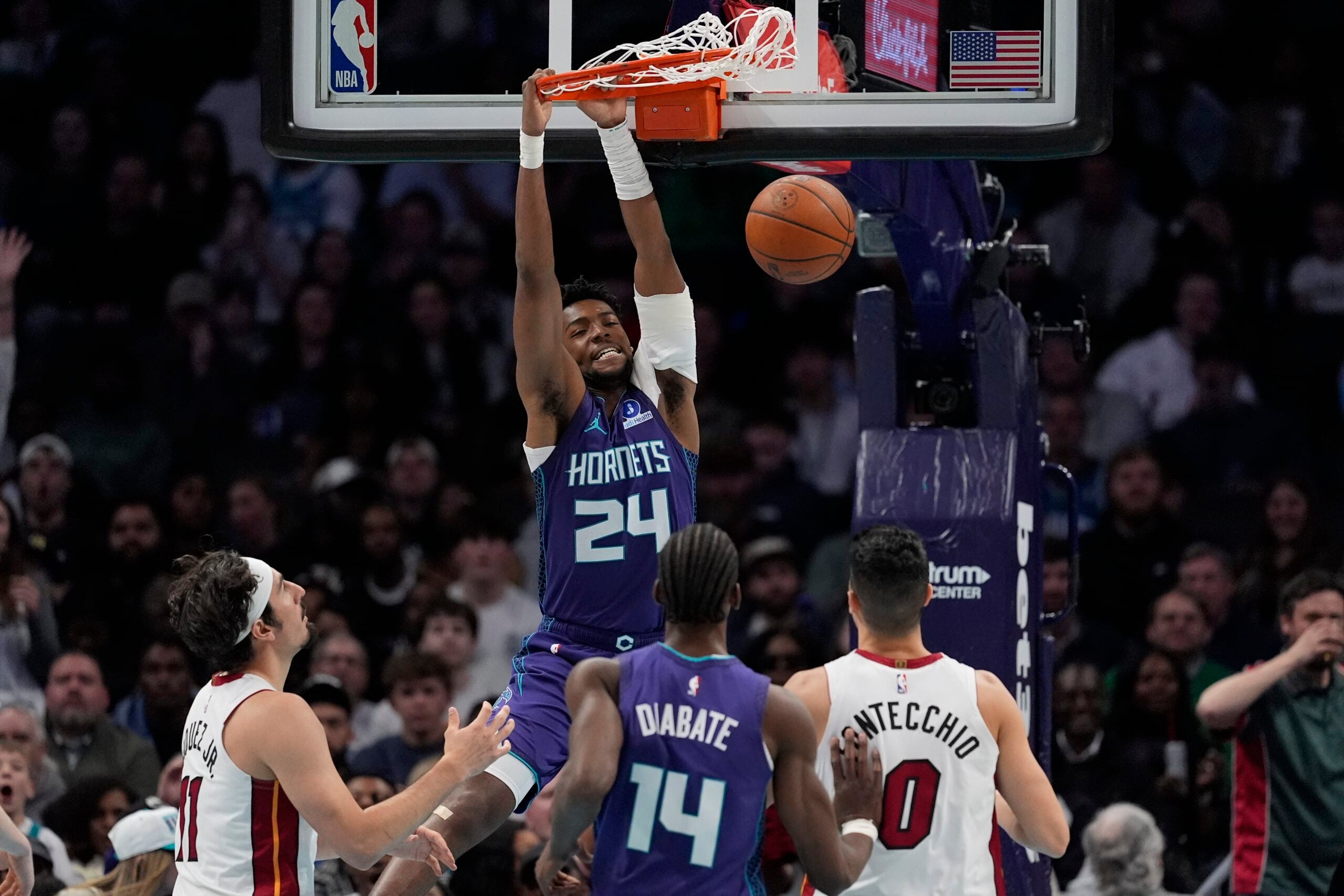 Mar 17, 2026; Charlotte, North Carolina, USA; Charlotte Hornets forward Brandon Miller (24) makes a slam dunk during the second half against the Miami Heat at Spectrum Center. Mandatory Credit: Jim Dedmon-Imagn Images