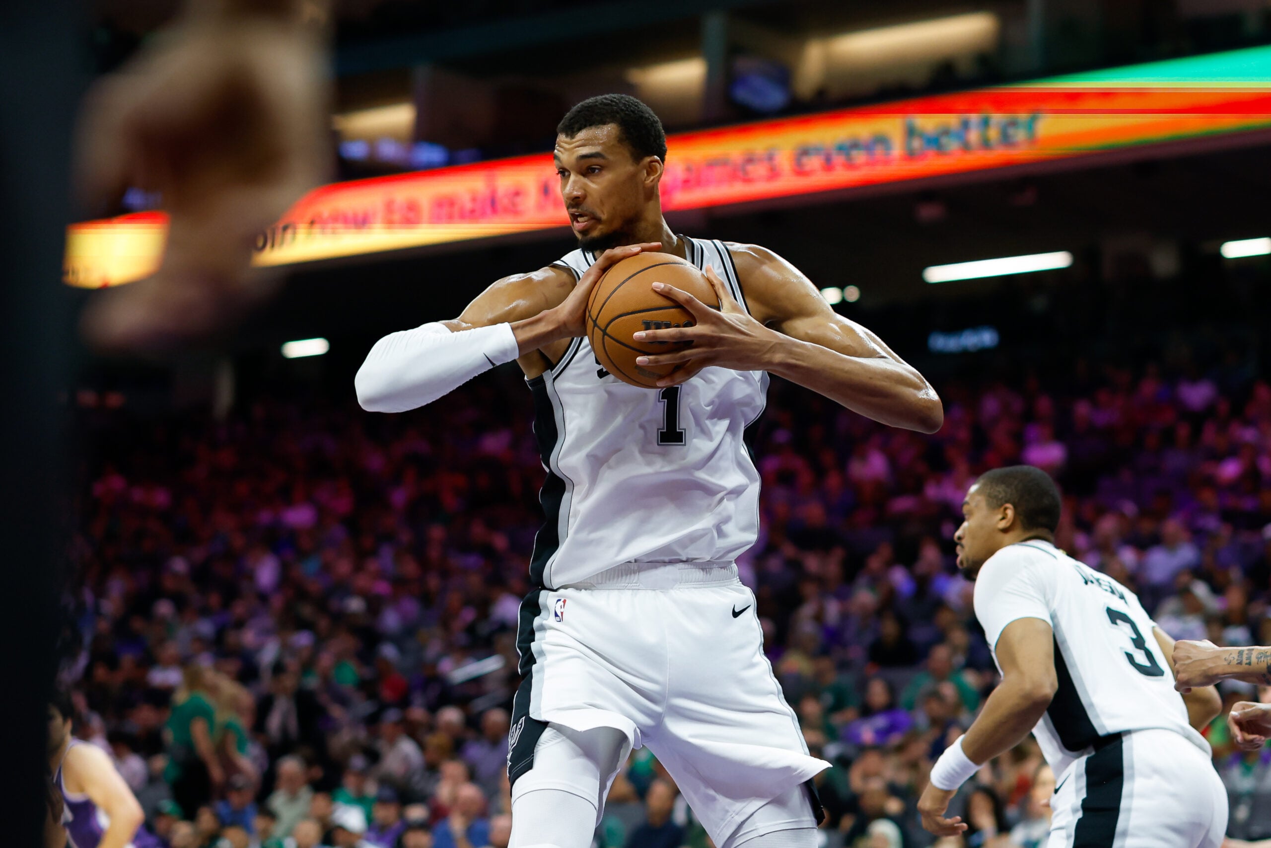 Mar 17, 2026; Sacramento, California, USA; San Antonio Spurs forward Victor Wembanyama (1) grabs a rebound during the third quarter against the Sacramento Kings at Golden 1 Center. Mandatory Credit: Sergio Estrada-Imagn Images