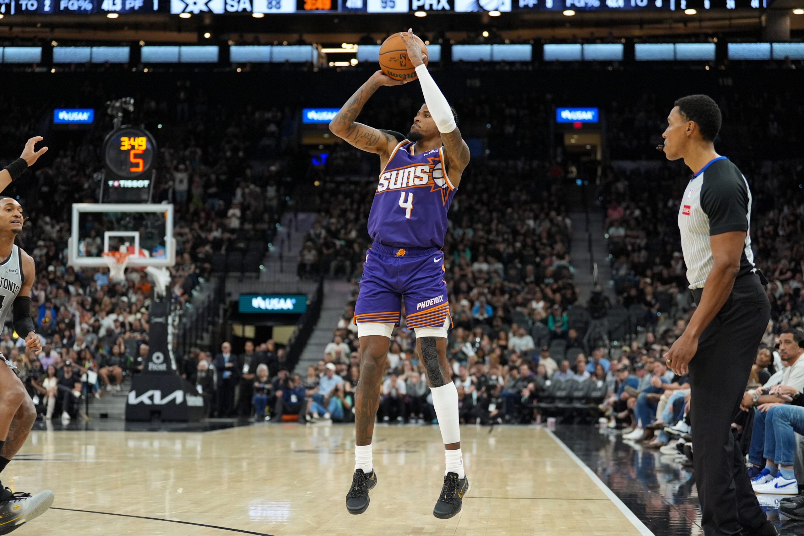 Mar 19, 2026; San Antonio, Texas, USA;  Phoenix Suns guard Jalen Green (4) shoots in the second half against the San Antonio Spurs at Frost Bank Center. Mandatory Credit: Daniel Dunn-Imagn Images