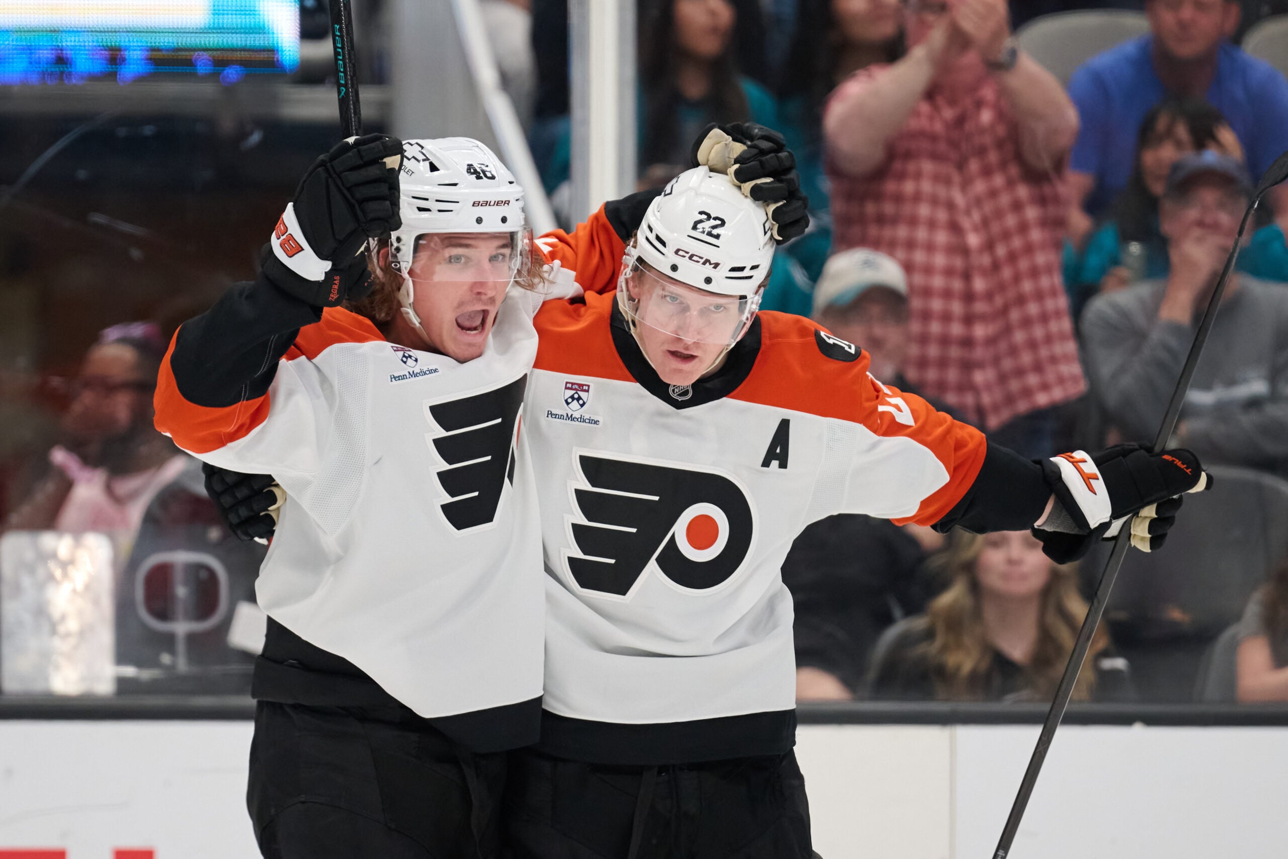 Mar 21, 2026; San Jose, California, USA; Philadelphia Flyers center Christian Dvorak (22) celebrates with center Trevor Zegras (46) after scoring the eventual game-winning goal against the San Jose Sharks during the third period at SAP Center at San Jose. Mandatory Credit: Robert Edwards-Imagn Images