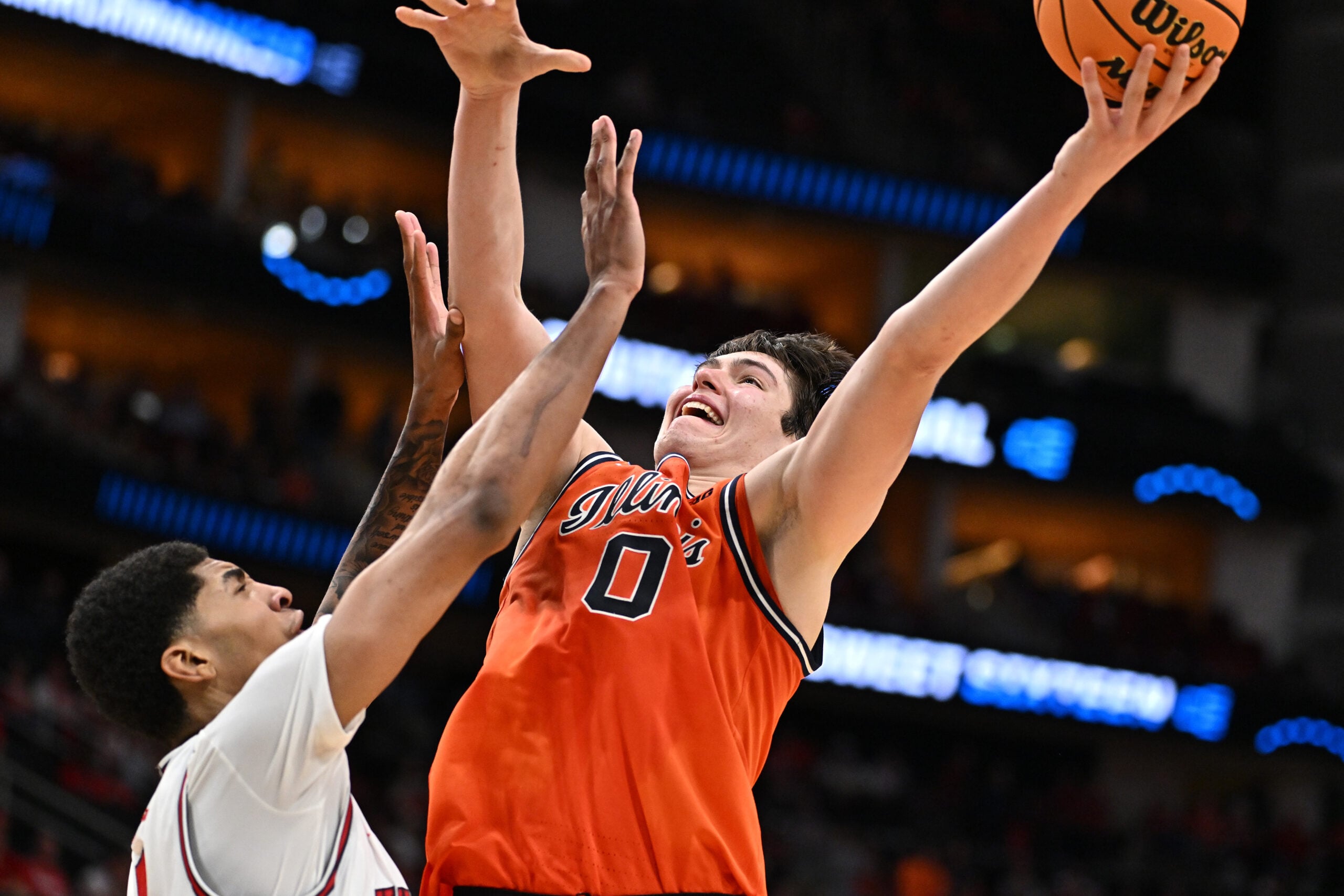 Mar 26, 2026; Houston, TX, USA; Illinois Fighting Illini forward David Mirkovic (0) shoots the ball against Houston Cougars center Chris Cenac Jr. (5) in the second half during a Sweet Sixteen game of the South Regional of the men's 2026 NCAA Tournament at Toyota Center. Mandatory Credit: Maria Lysaker-Imagn Images