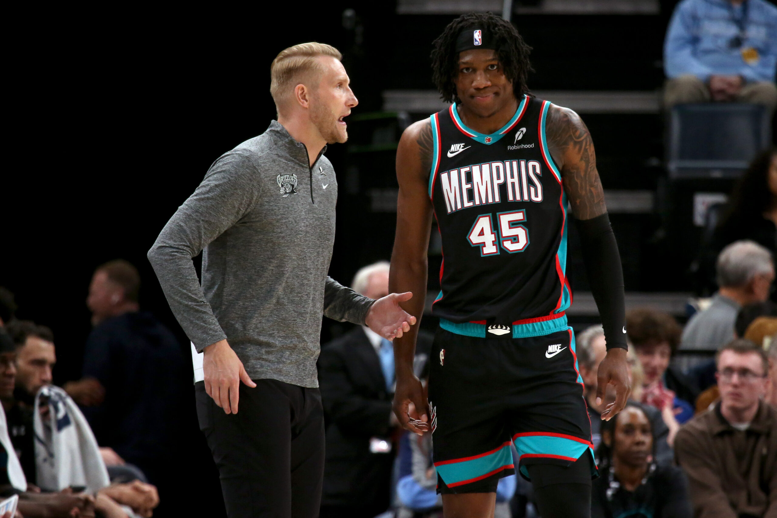 Mar 27, 2026; Memphis, Tennessee, USA; Memphis Grizzlies head coach Tuomas Iisalo talks with forward GG Jackson (45) during the third quarter against the Houston Rockets at FedExForum. Mandatory Credit: Petre Thomas-Imagn Images