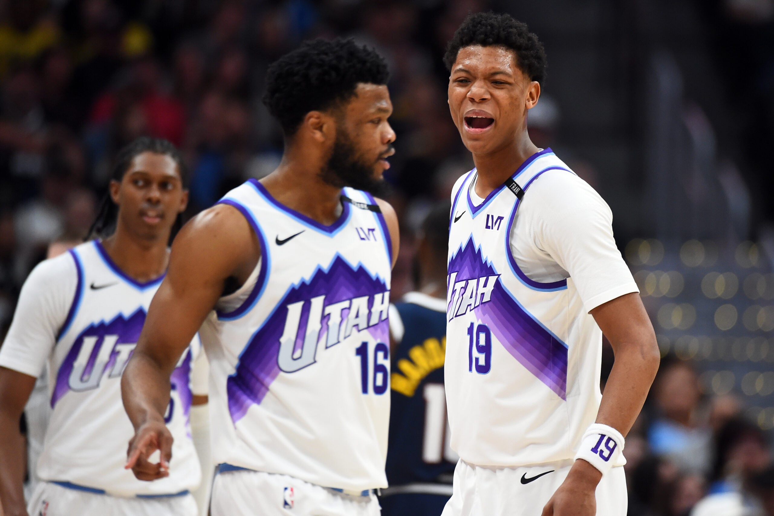 Mar 27, 2026; Denver, Colorado, USA; Utah Jazz guard Ace Bailey (19) celebrates with guard Elijah Harkless (16) during the second half against the Denver Nuggets at Ball Arena. Mandatory Credit: Christopher Hanewinckel-Imagn Images
