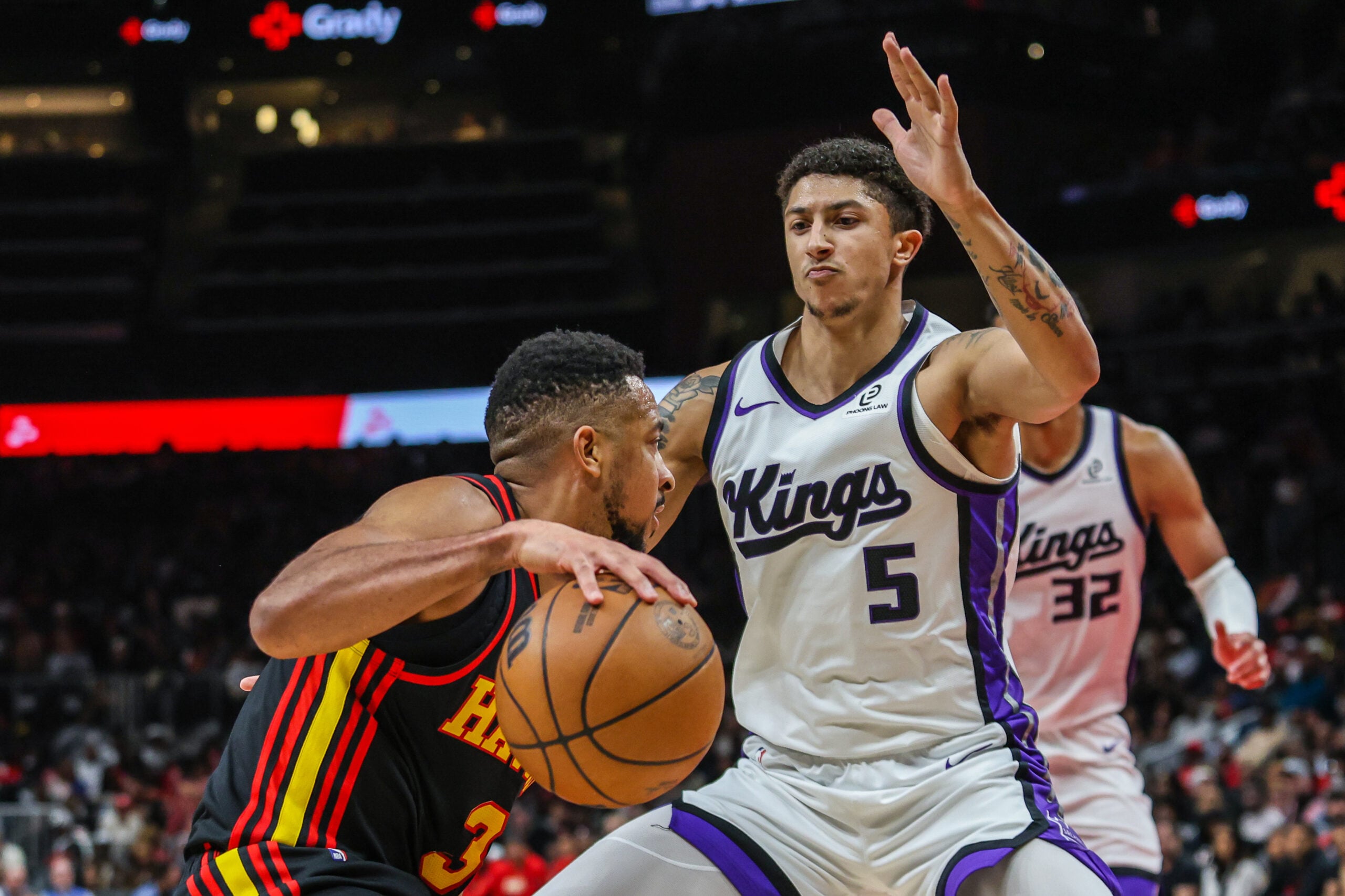 Mar 28, 2026; Atlanta, Georgia, USA; Atlanta Hawks guard CJ McCollum (3) drives the ball towards the basket against Sacramento Kings guard Nique Clifford (5) during the fourth quarter at State Farm Arena. Mandatory Credit: Jordan Godfree-Imagn Images
