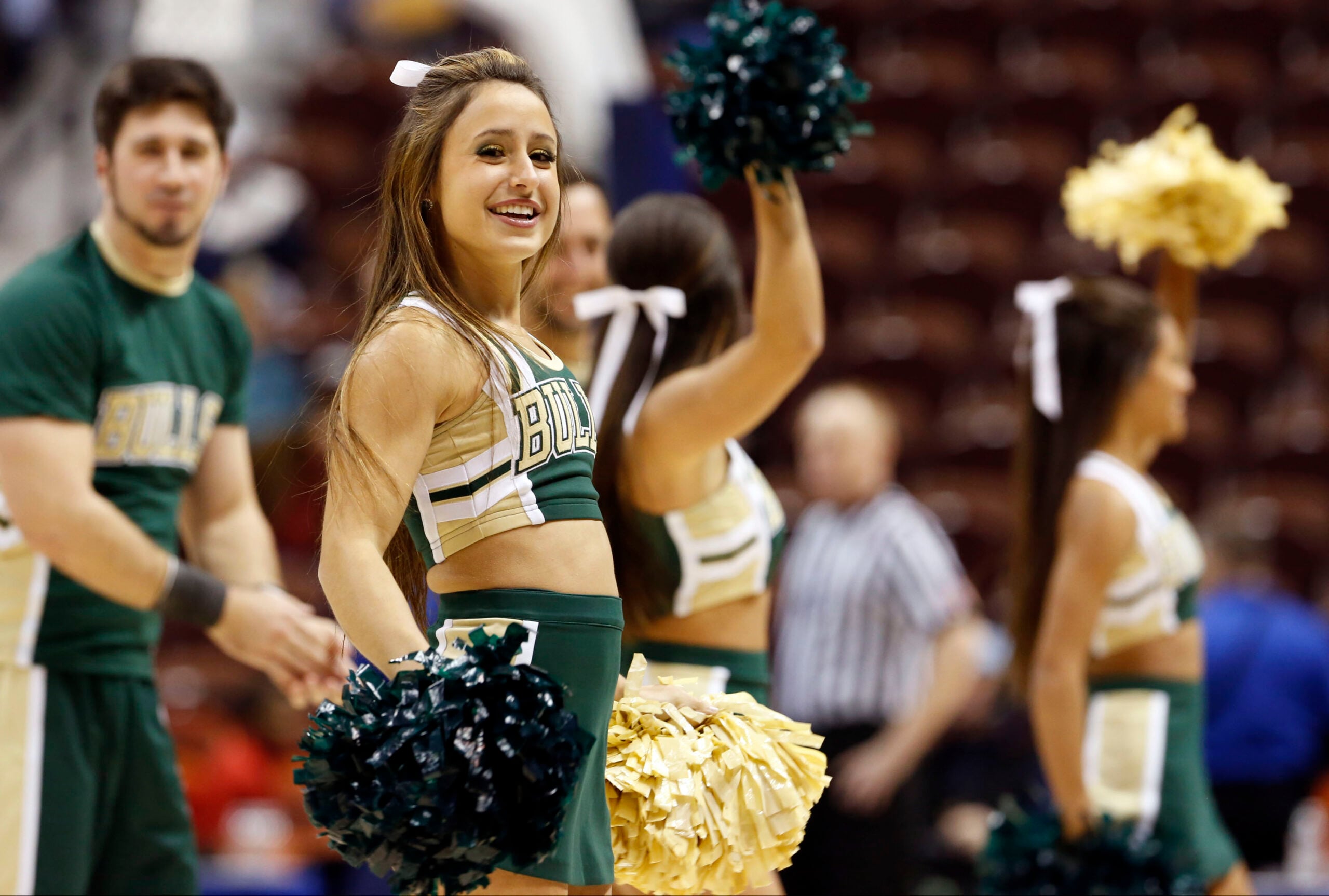 Mar 7, 2015; Uncasville, CT, USA; The South Florida Bulls cheerleaders perform during a break in the action against the Memphis Lady Tigers in the second half during the quarterfinal round of the American Conference Tournament at Mohegan Sun Arena. USF defeated Memphis 79-51. Mandatory Credit: David Butler II-Imagn Images