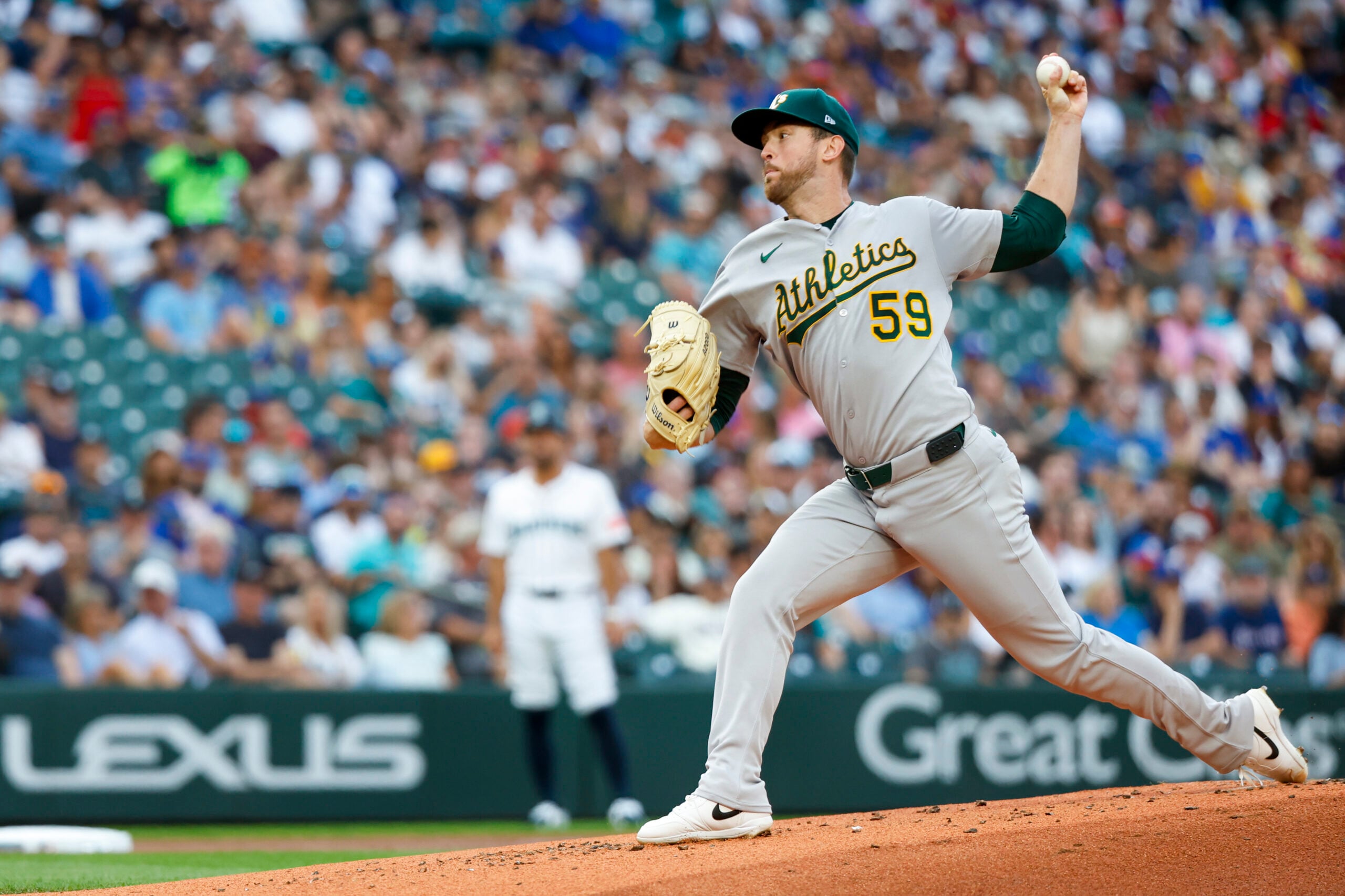 Aug 23, 2025; Seattle, Washington, USA; Athletics starting pitcher Jeffrey Springs (59) throws against the Seattle Mariners during the first inning at T-Mobile Park. Mandatory Credit: Joe Nicholson-Imagn Images
