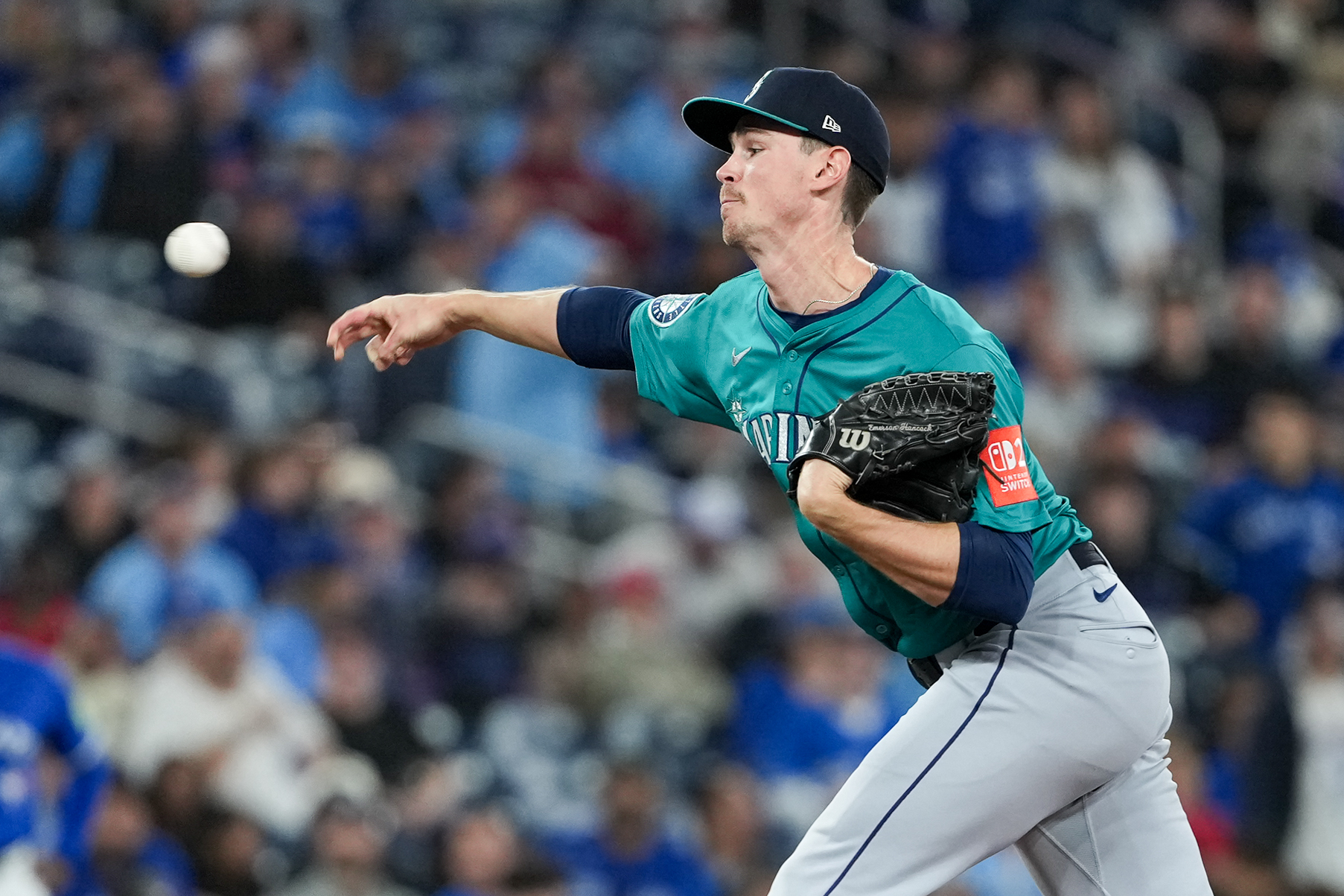 Oct 13, 2025; Toronto, Ontario, CAN; Seattle Mariners pitcher Emerson Hancock (26) delivers a pitch in the ninth inning against the Toronto Blue Jays during game two of the ALCS round for the 2025 MLB playoffs at Rogers Centre. Mandatory Credit: Nick Turchiaro-Imagn Images