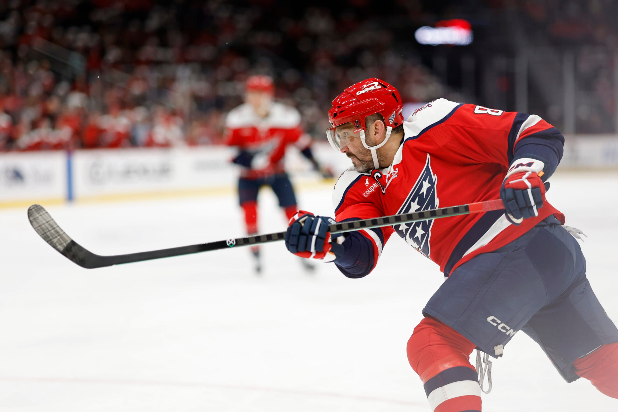 Dec 7, 2025; Washington, District of Columbia, USA; Washington Capitals left wing Alex Ovechkin (8) shoots the puck against the Columbus Blue Jackets during the third period at Capital One Arena. Mandatory Credit: Geoff Burke-Imagn Images
