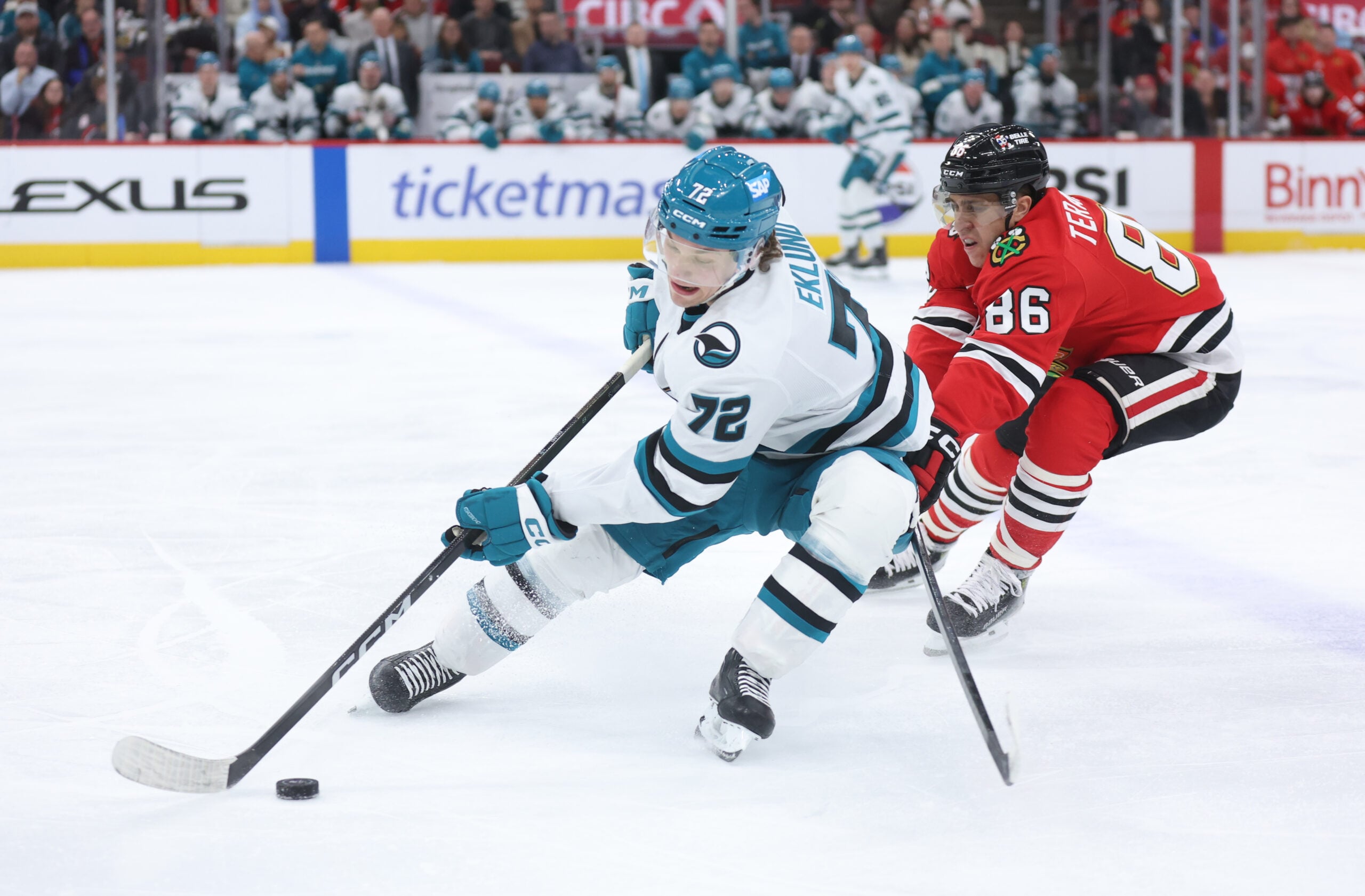 Feb 2, 2026; Chicago, Illinois, USA; San Jose Sharks left wing William Eklund (72) and Chicago Blackhawks center Teuvo Teravainen (86) during the third period at United Center. Mandatory Credit: Talia Sprague-Imagn Images