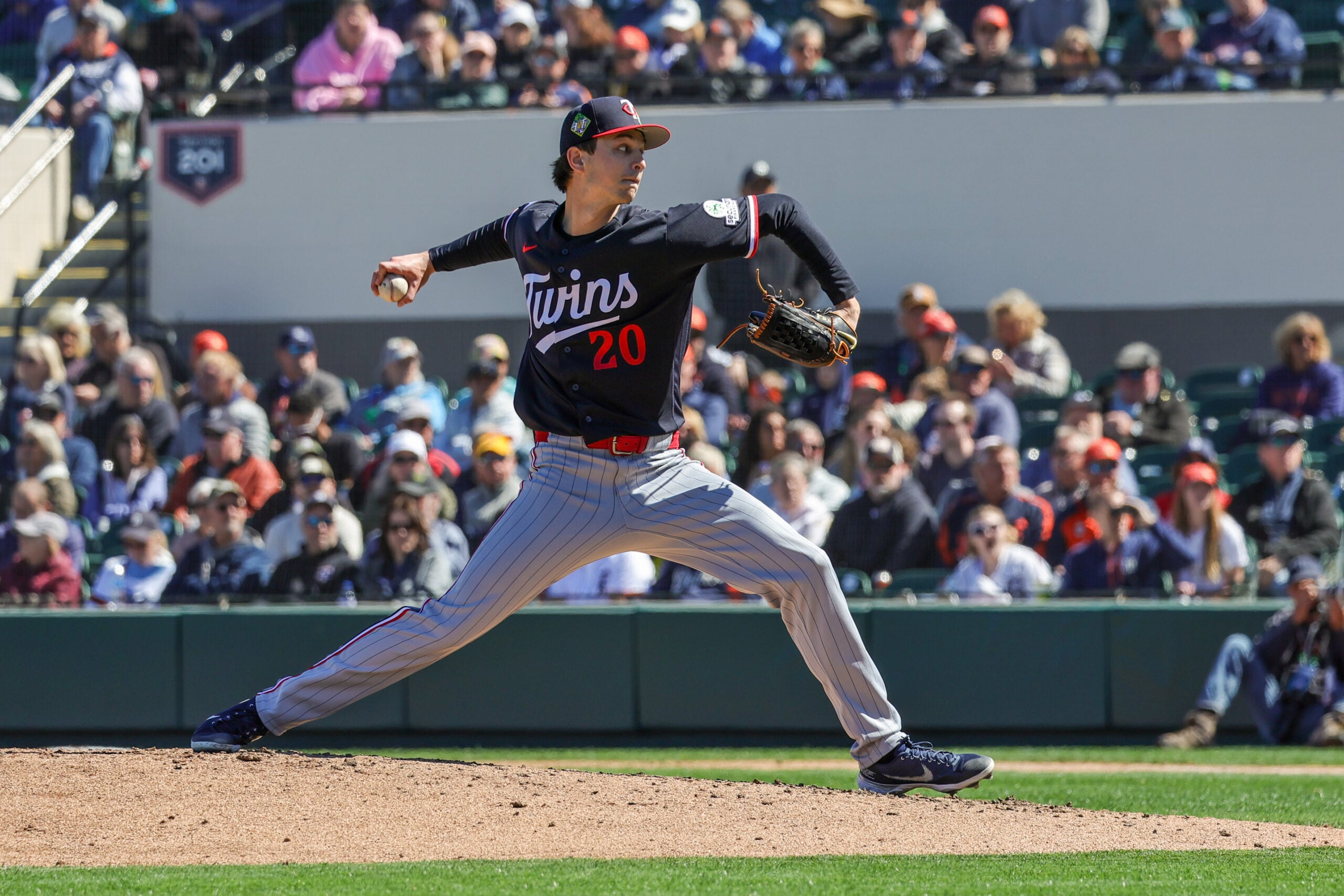Feb 23, 2026; Lakeland, Florida, USA; Minnesota Twins pitcher Mick Abel (20) pitches during the third inning against the Detroit Tigers at Publix Field at Joker Marchant Stadium. Mandatory Credit: Mike Watters-Imagn Images