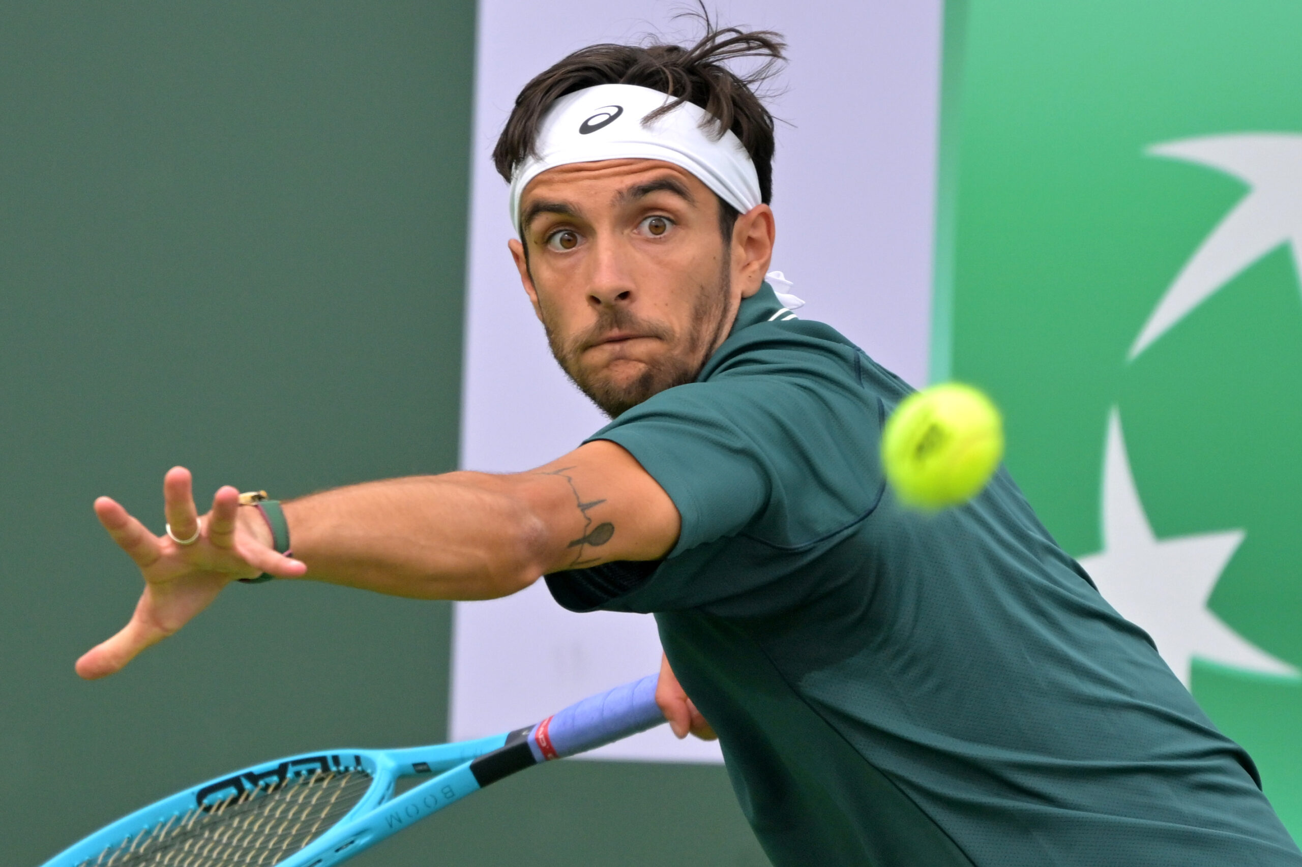 Mar 6, 2026; Indian Wells, CA, USA;  Lorenzo Musetti (ITA) hits a shot during his second round match against Marton Fucsovics (HUN) in the BNP Paribas Open at the Indian Wells Tennis Garden. Mandatory Credit: Jayne Kamin-Oncea-Imagn Images