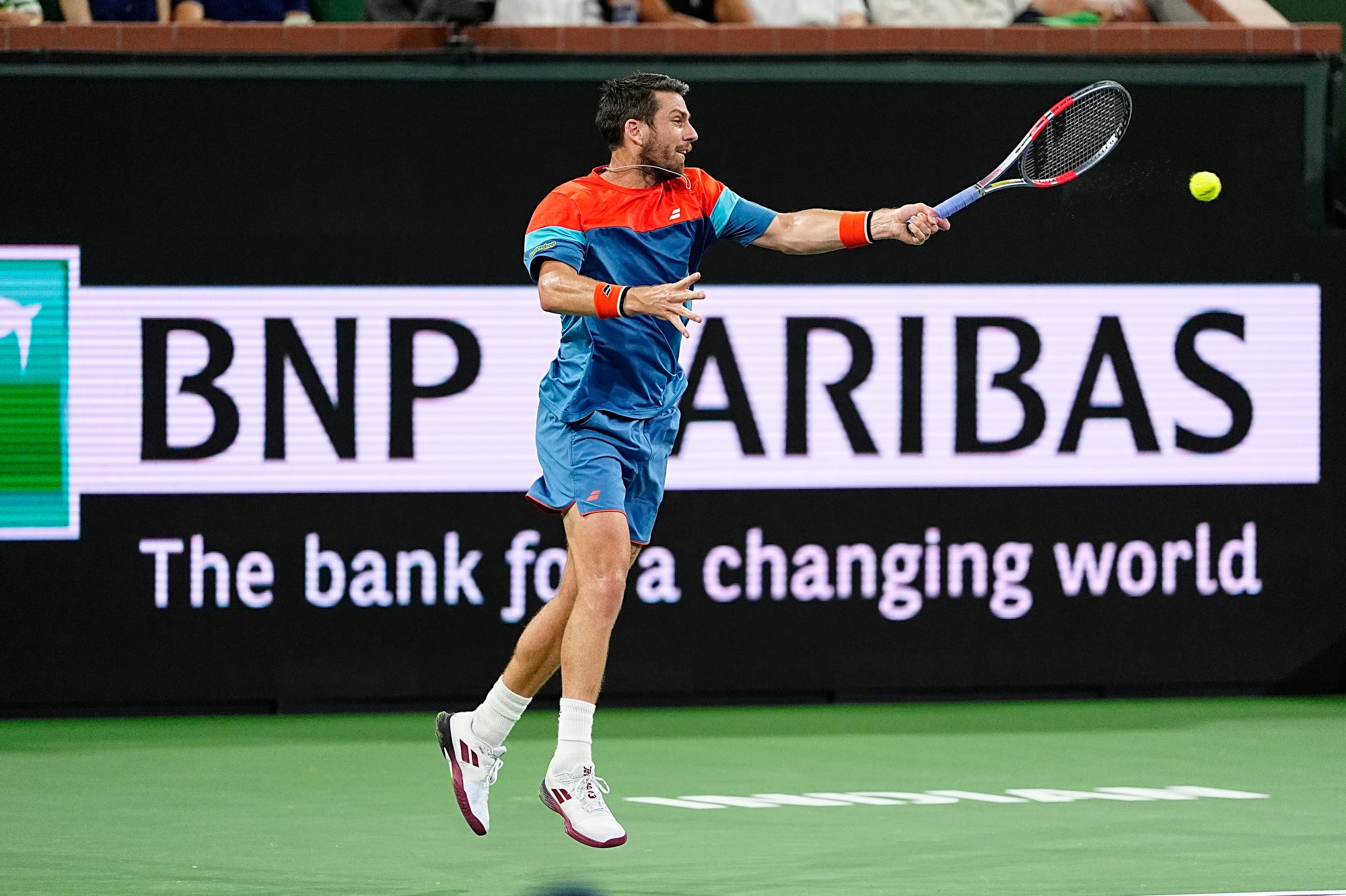 Cameron Norrie returns to Carlos Alcaraz during their BNP Paribas Open quarterfinal match on Stadium 1 at the Indian Wells Tennis Garden in Indian Wells, Calif., on Thursday, March 12, 2026.