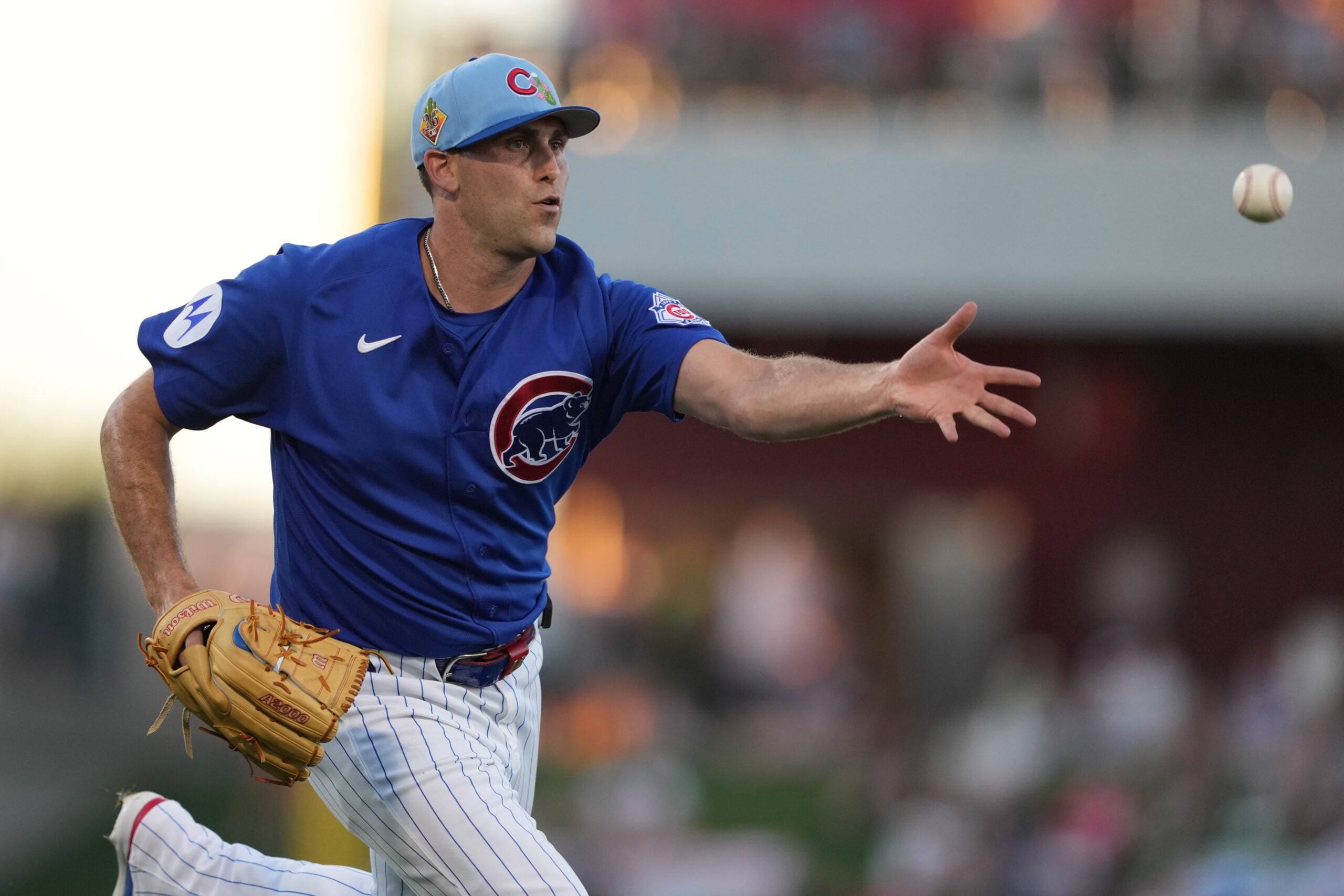 Mar 20, 2026; Mesa, Arizona, USA; Chicago Cubs pitcher Matthew Boyd (16) flips the ball for an out against the Cincinnati Reds in the second inning at Sloan Park. Mandatory Credit: Rick Scuteri-Imagn Images
