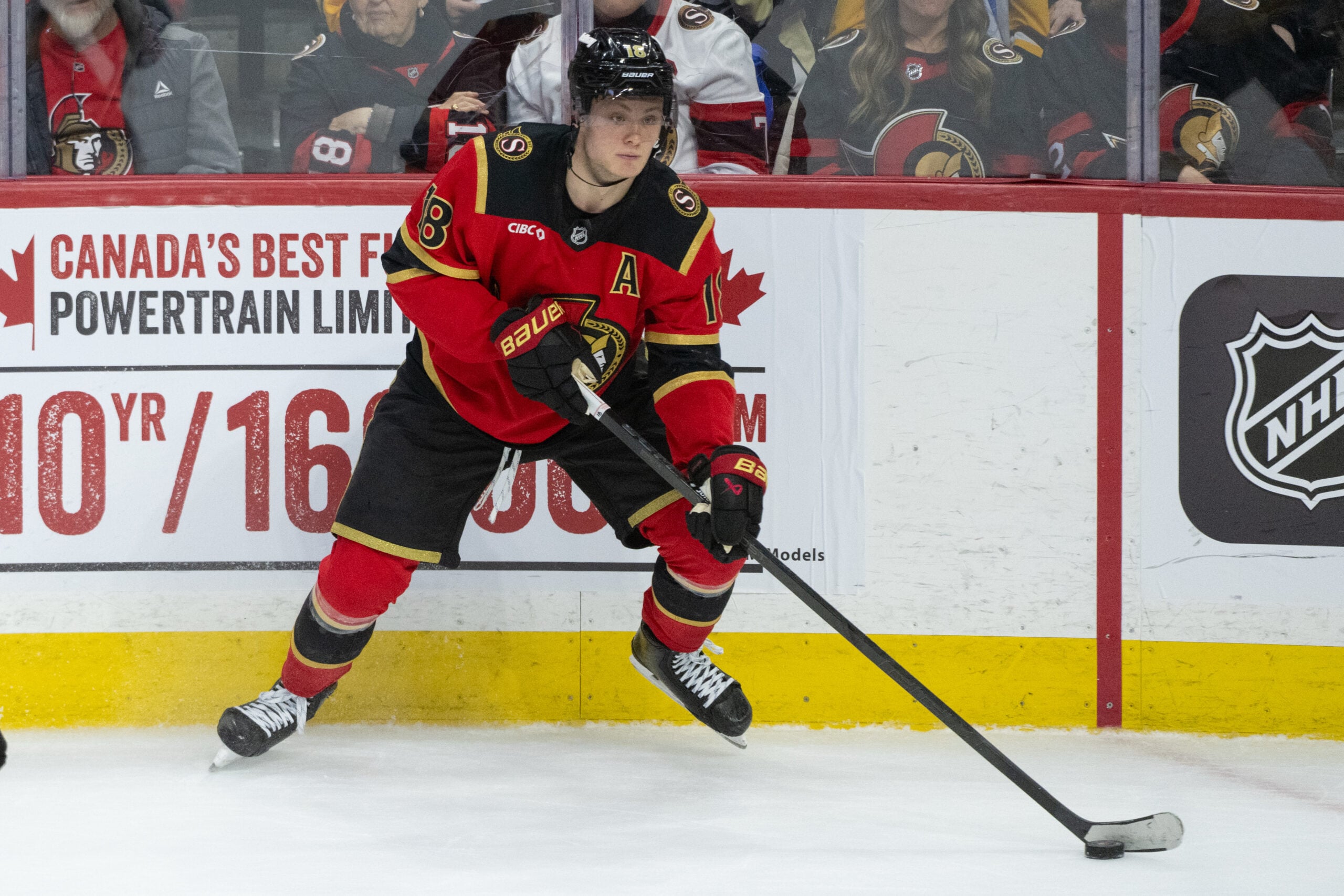 Mar 26, 2026; Ottawa, Ontario, CAN; Ottawa Senators center Tim Stutzle (18) controls the puck in overtime against the Pittsburgh Penguins at the Canadian Tire Centre. Mandatory Credit: Marc DesRosiers-IMAGN Images