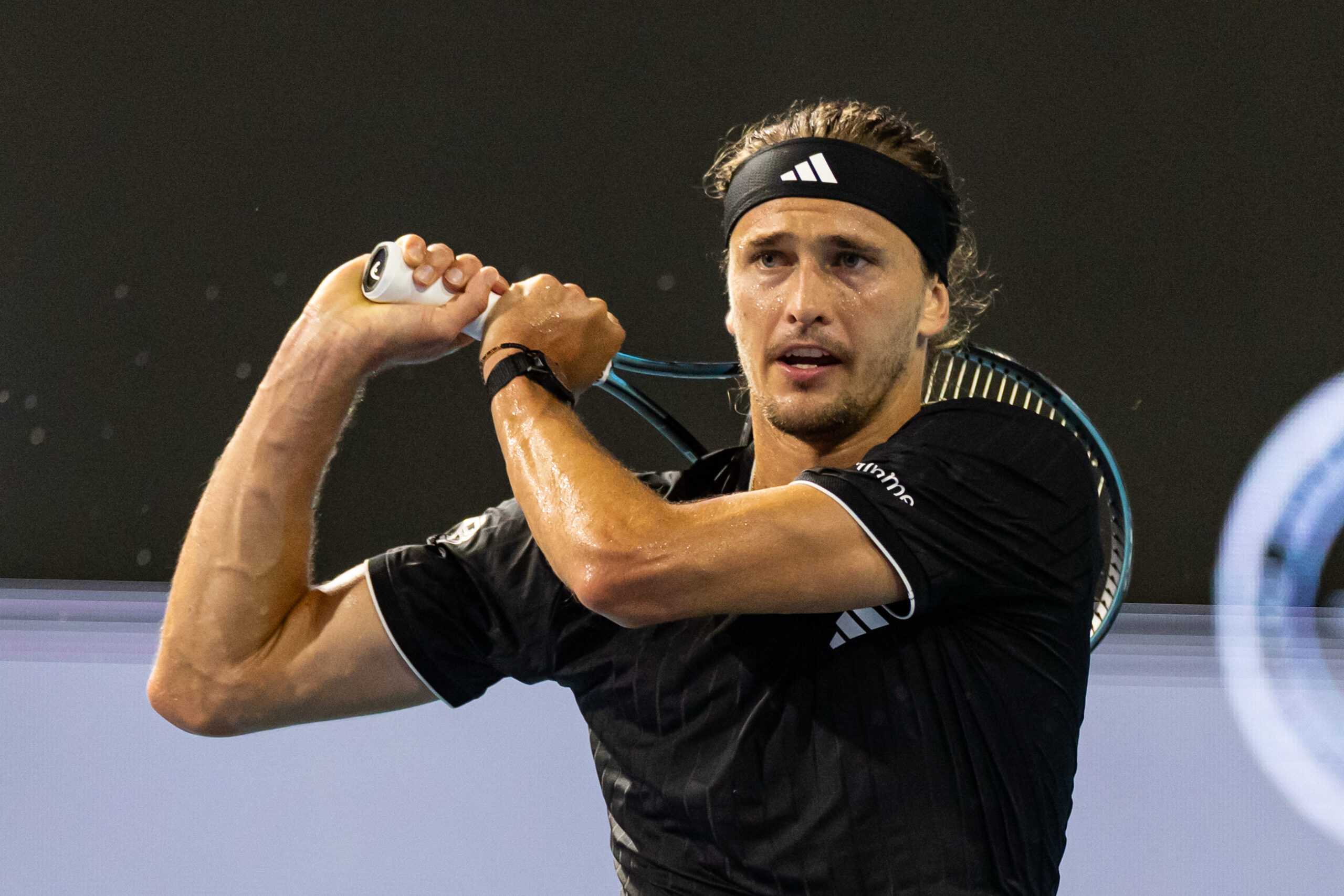 Mar 27, 2026; Miami Gardens, FL, USA;   Alexander Zverev of Germany hits a backhand against Jannik Sinner of Italy in the semi-finals of the men’s singles at the Miami Open at the Hard Rock Stadium. Mandatory Credit: Mike Frey-Imagn Images