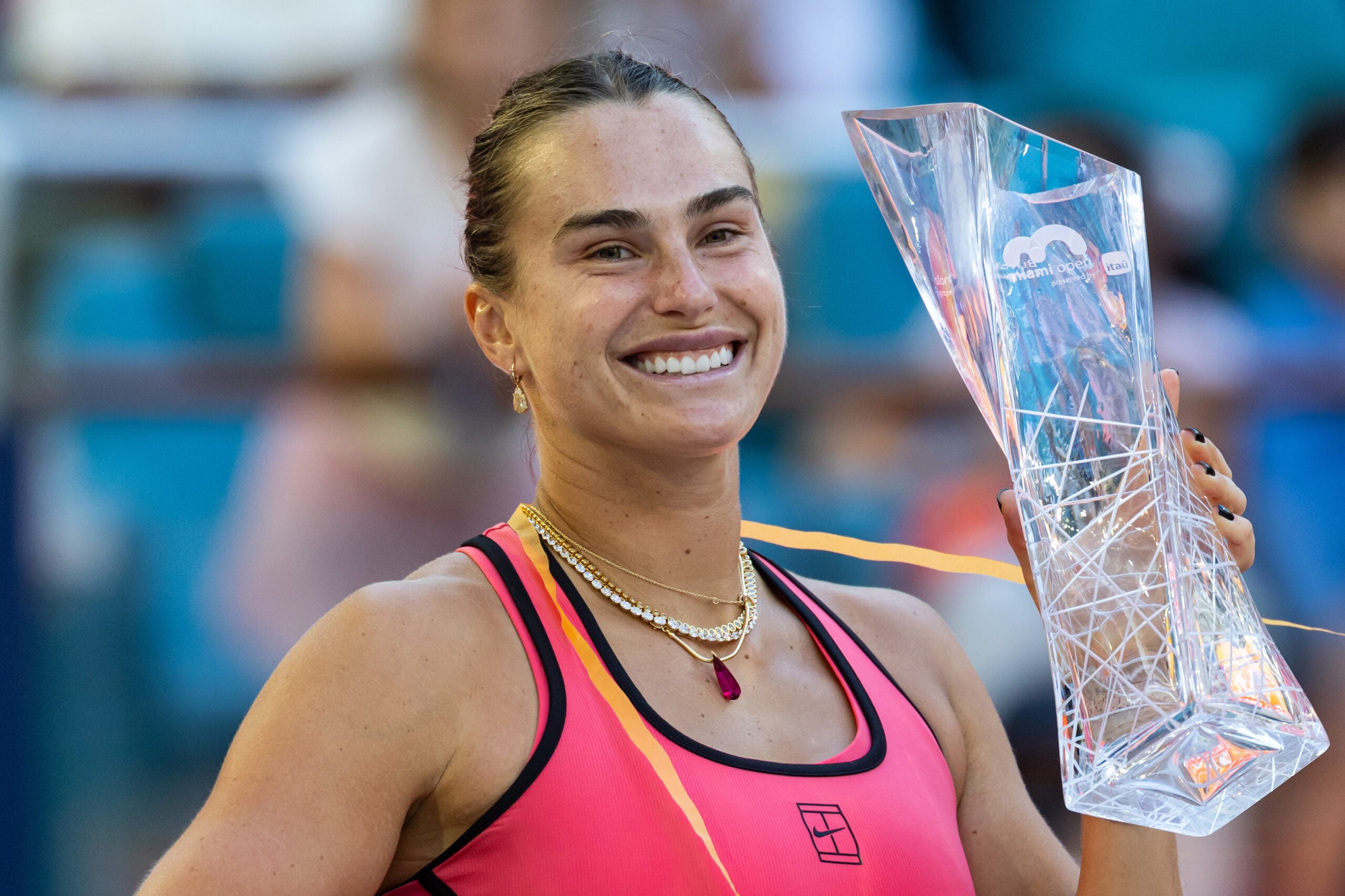 Mar 28, 2026; Miami Gardens, FL, USA; Aryna Sabalenka of Belarus poses with the Butch Buchholz Championship trophy after defeating Coco Gauff of the United States in the final of the women’s singles at the Hard Rock Stadium. Mandatory Credit: Mike Frey-Imagn Images
