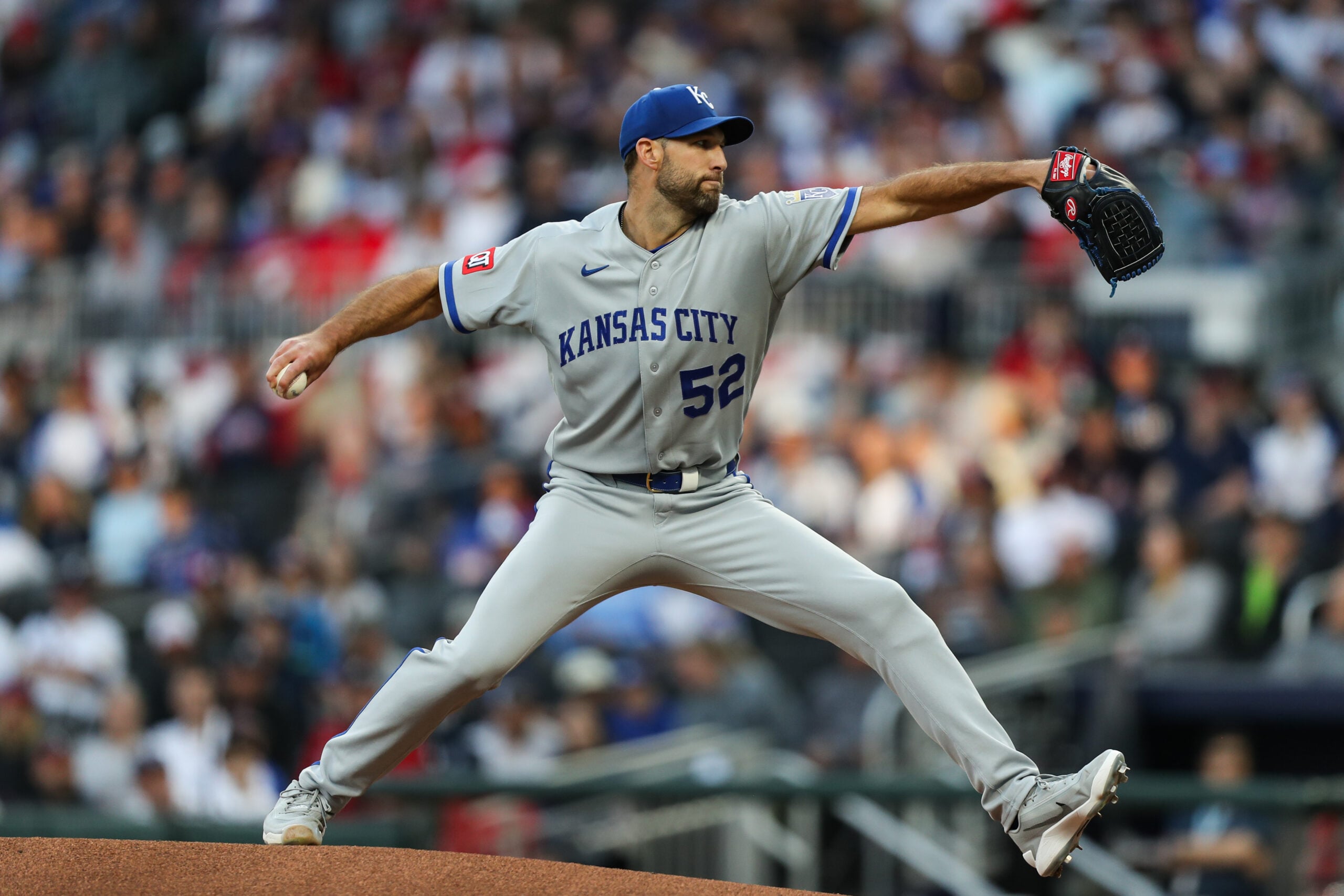 Mar 28, 2026; Cumberland, Georgia, USA; Kansas City Royals starting pitcher Michael Wacha (52) throws against the Atlanta Braves in the first inning at Truist Park. Mandatory Credit: Mady Mertens-Imagn Images