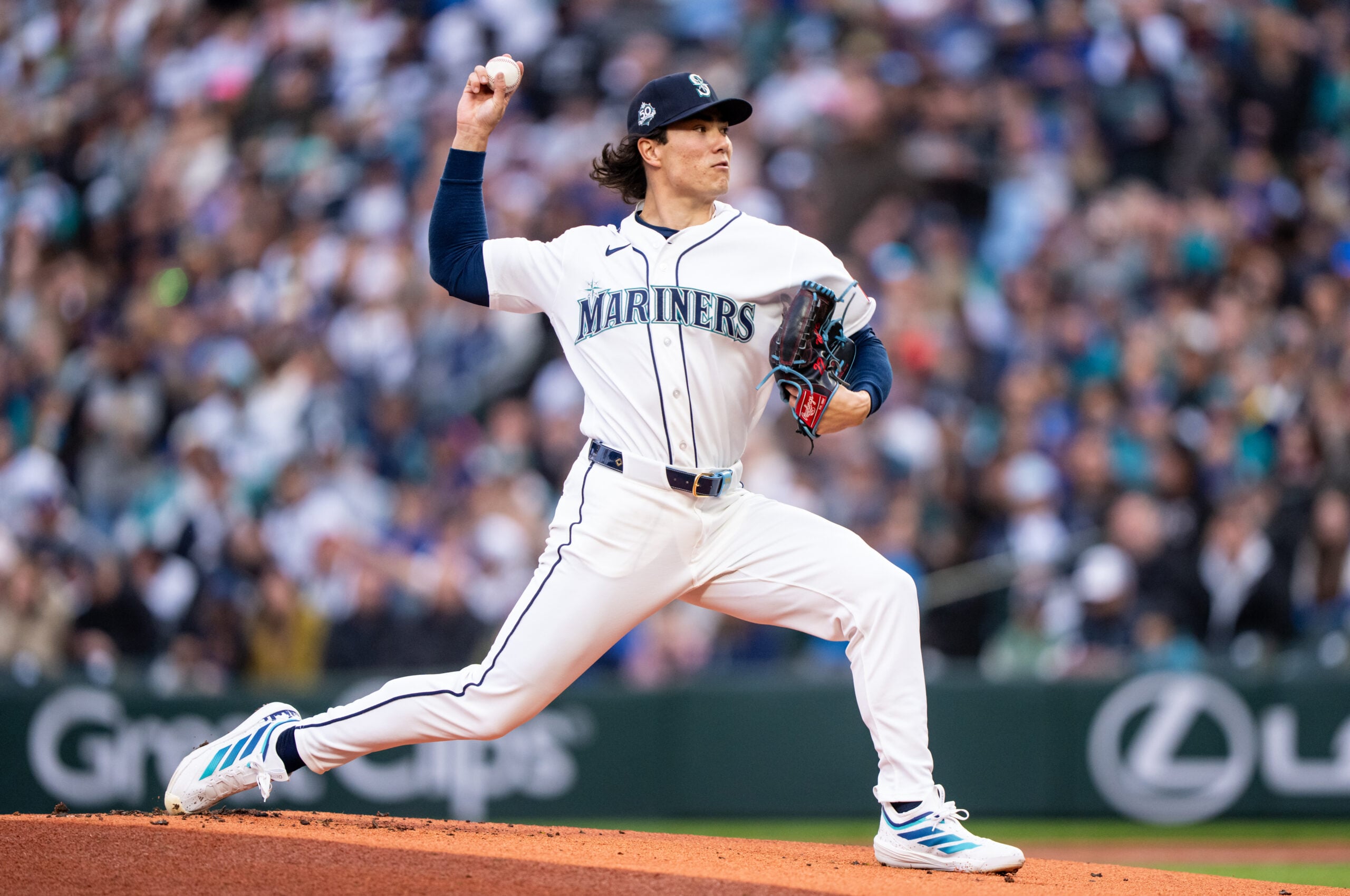 Mar 28, 2026; Seattle, Washington, USA; Seattle Mariners starter Bryan Woo (22) delivers a pitch during the first inning against the Cleveland Guardians at T-Mobile Park. Mandatory Credit: Stephen Brashear-Imagn Images