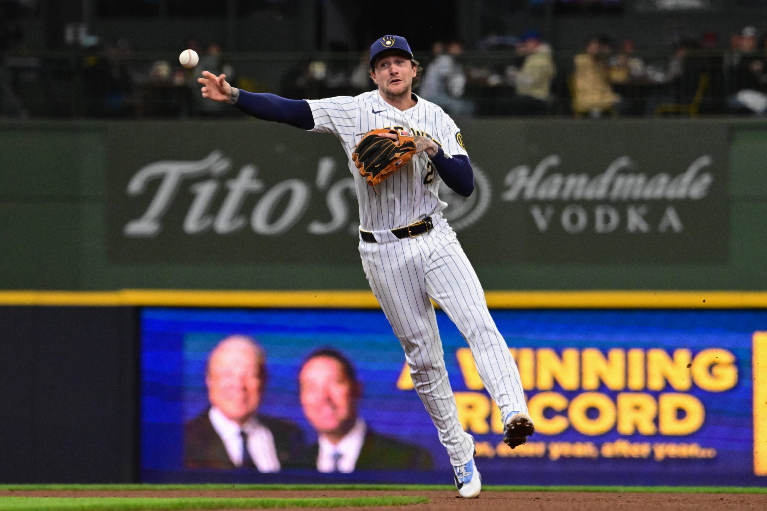Mar 29, 2026; Milwaukee, Wisconsin, USA; Milwaukee Brewers second baseman Brice Turang (2) throws out Chicago White Sox left fielder Austin Hays in the seventh inning at American Family Field. Mandatory Credit: Benny Sieu-Imagn Images