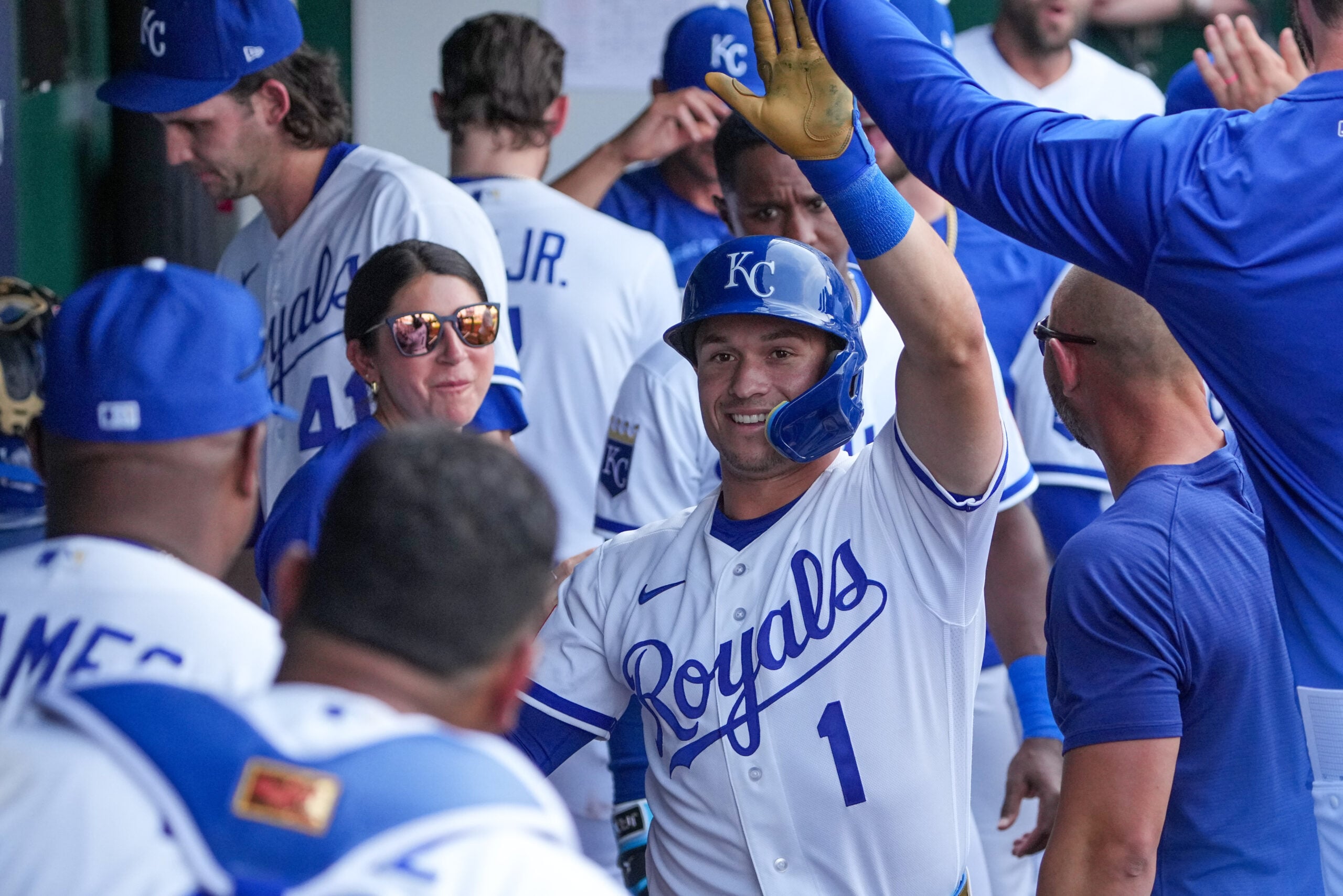 Mar 30, 2026; Kansas City, Missouri, USA; Kansas City Royals left fielder Isaac Collins (1) celebrates in the dugout after hitting a solo home run against the Minnesota Twins in the seventh inning at Kauffman Stadium. Mandatory Credit: Denny Medley-Imagn Images