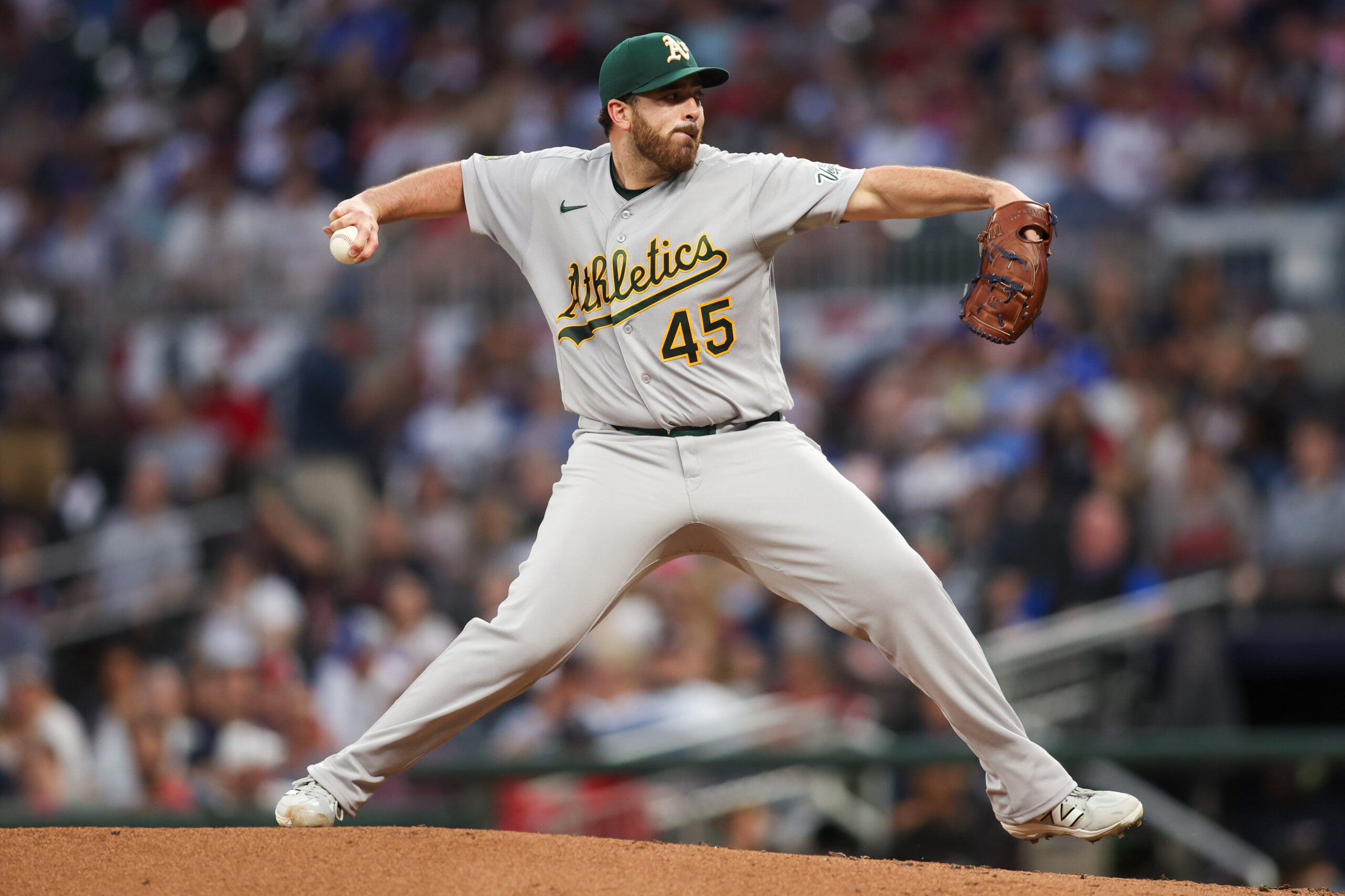 Mar 31, 2026; Atlanta, Georgia, USA; Athletics starting pitcher Aaron Civale (45) throws against the Atlanta Braves in the third inning at Truist Park. Mandatory Credit: Brett Davis-Imagn Images