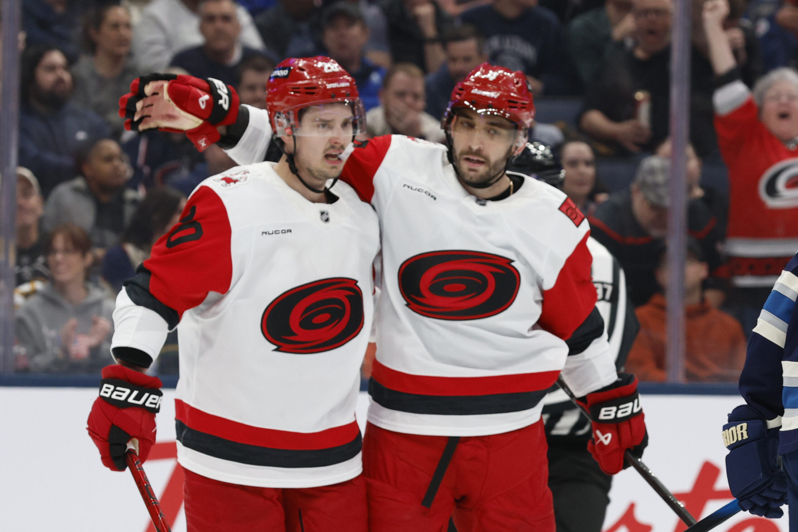 Mar 31, 2026; Columbus, Ohio, USA; Carolina Hurricanes defenseman Shayne Gostisbehere (4) celebrates his goal against the Columbus Blue Jackets during the first period at Nationwide Arena. Mandatory Credit: Russell LaBounty-Imagn Images