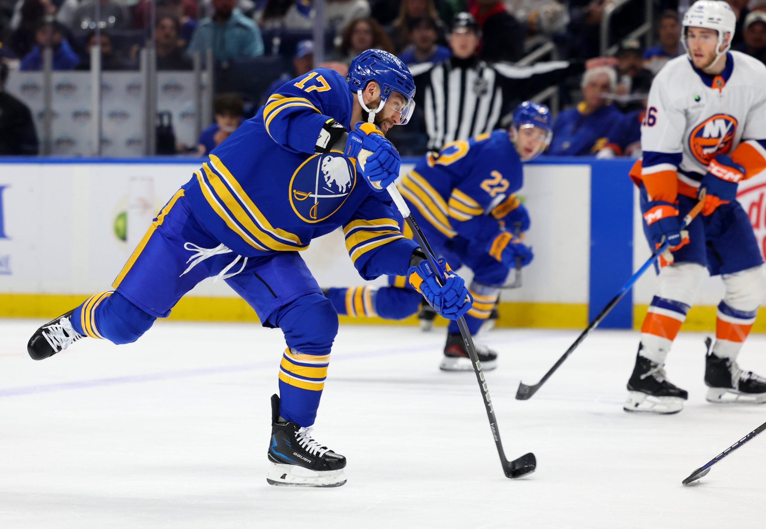 Mar 31, 2026; Buffalo, New York, USA;  Buffalo Sabres left wing Jason Zucker (17) takes a shot on goal during the second period against the New York Islanders at KeyBank Center. Mandatory Credit: Timothy T. Ludwig-Imagn Images