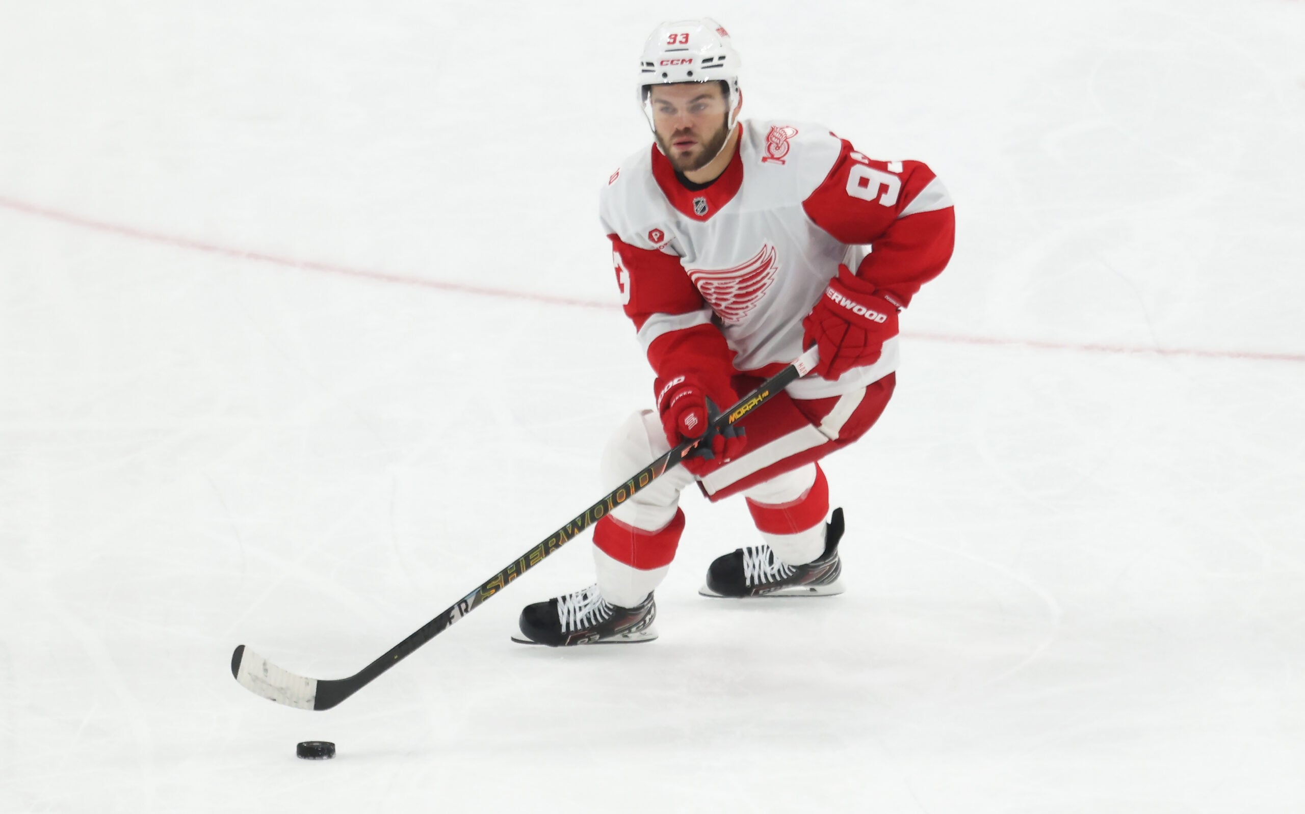 Mar 31, 2026; Pittsburgh, Pennsylvania, USA;  Detroit Red Wings right wing Alex DeBrincat (93) skates with the puck against the Pittsburgh Penguins during the third period at PPG Paints Arena. Mandatory Credit: Charles LeClaire-Imagn Images