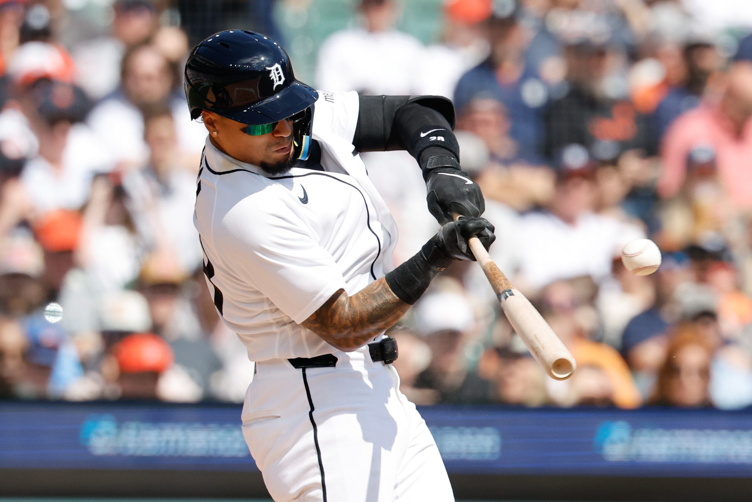 Apr 3, 2026; Detroit, Michigan, USA;  Detroit Tigers center fielder Javier Baez (28) hits a single in the third inning against the St. Louis Cardinals at Comerica Park. Mandatory Credit: Rick Osentoski-Imagn Images
